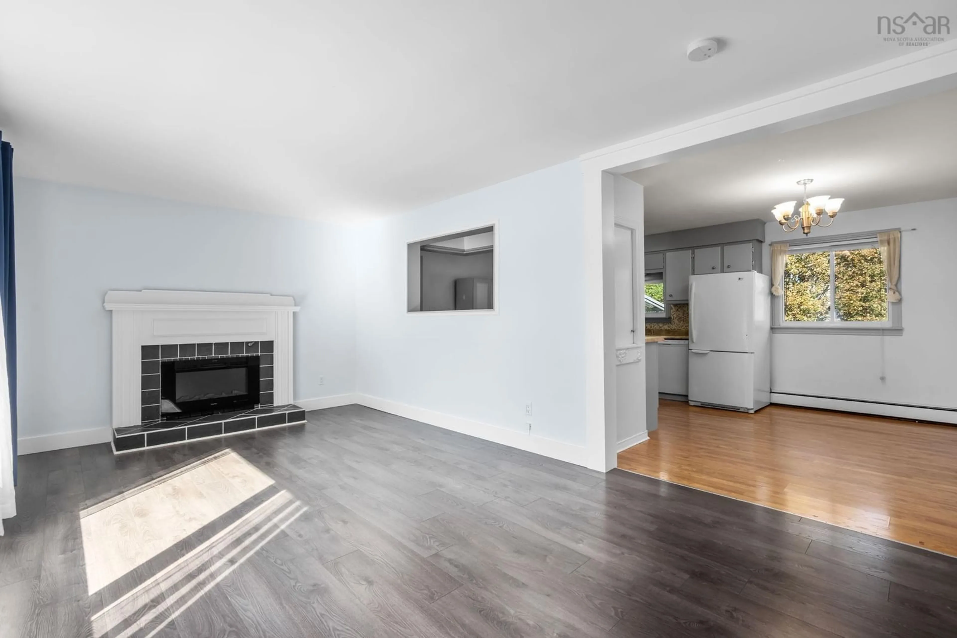 Living room with furniture, wood/laminate floor for 149 Glenwood Dr, Truro Nova Scotia B2N 1P5
