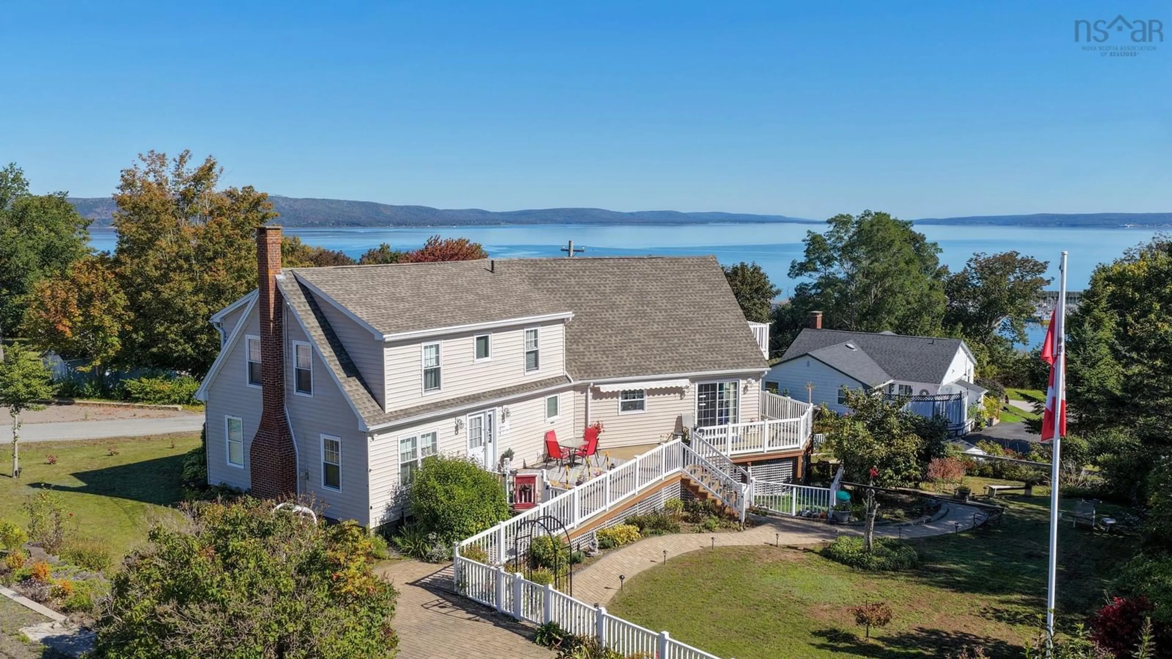 A pic from outside/outdoor area/front of a property/back of a property/a pic from drone, water/lake/river/ocean view for 39 Sydney St, Digby Nova Scotia B0V 1A0