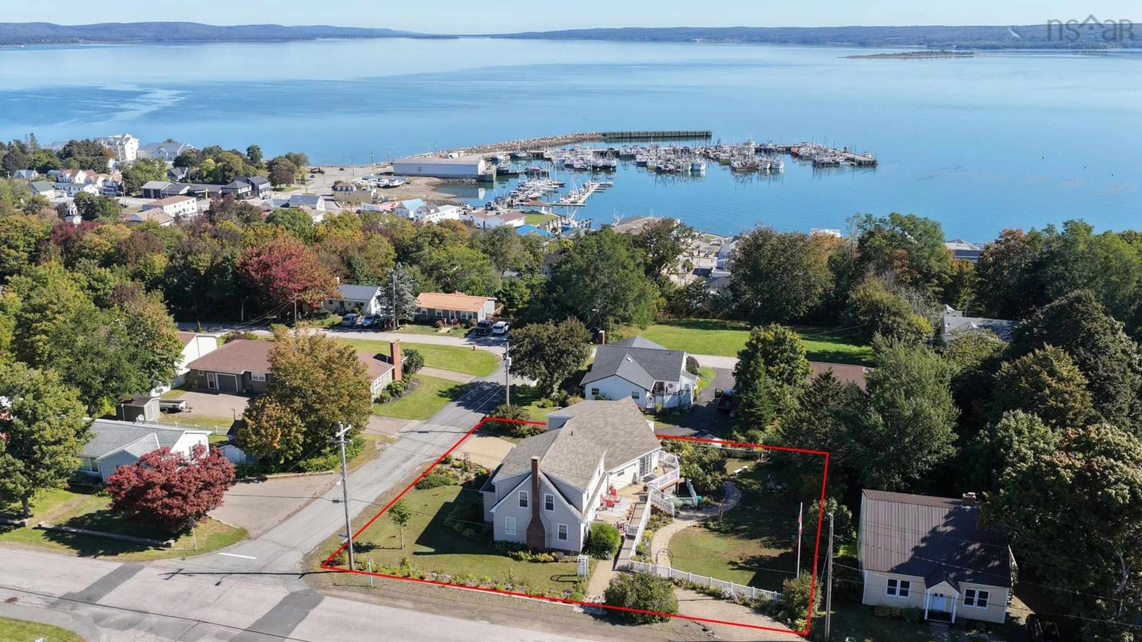 A pic from outside/outdoor area/front of a property/back of a property/a pic from drone, water/lake/river/ocean view for 39 Sydney St, Digby Nova Scotia B0V 1A0
