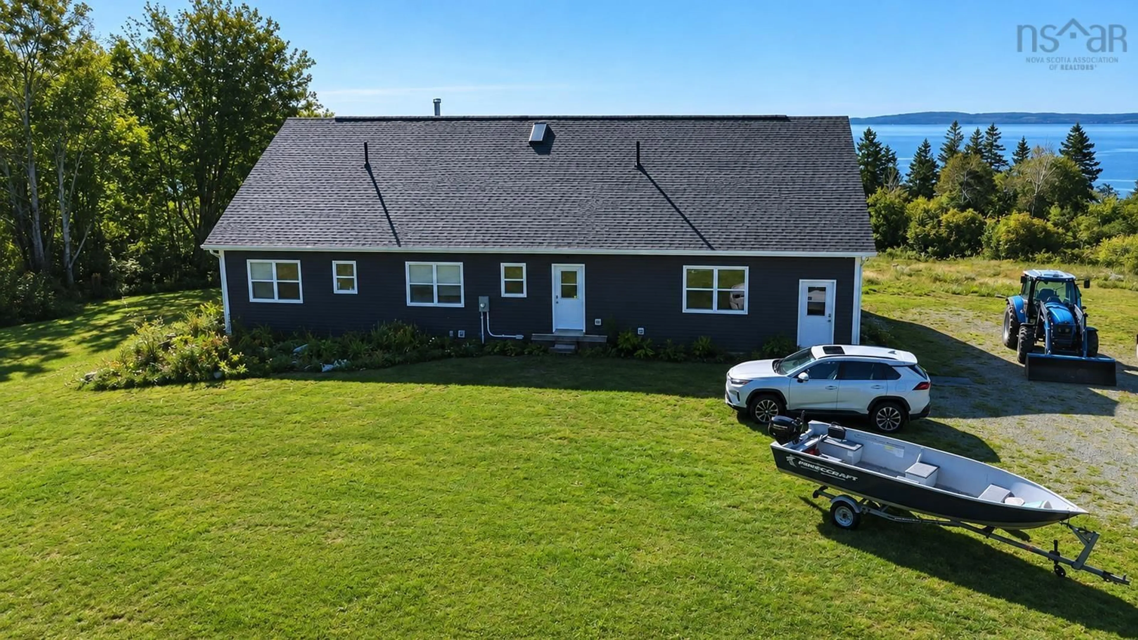 A pic from outside/outdoor area/front of a property/back of a property/a pic from drone, street for 2285 Port Malcolm Road, Port Malcolm Nova Scotia B9A 1Z6