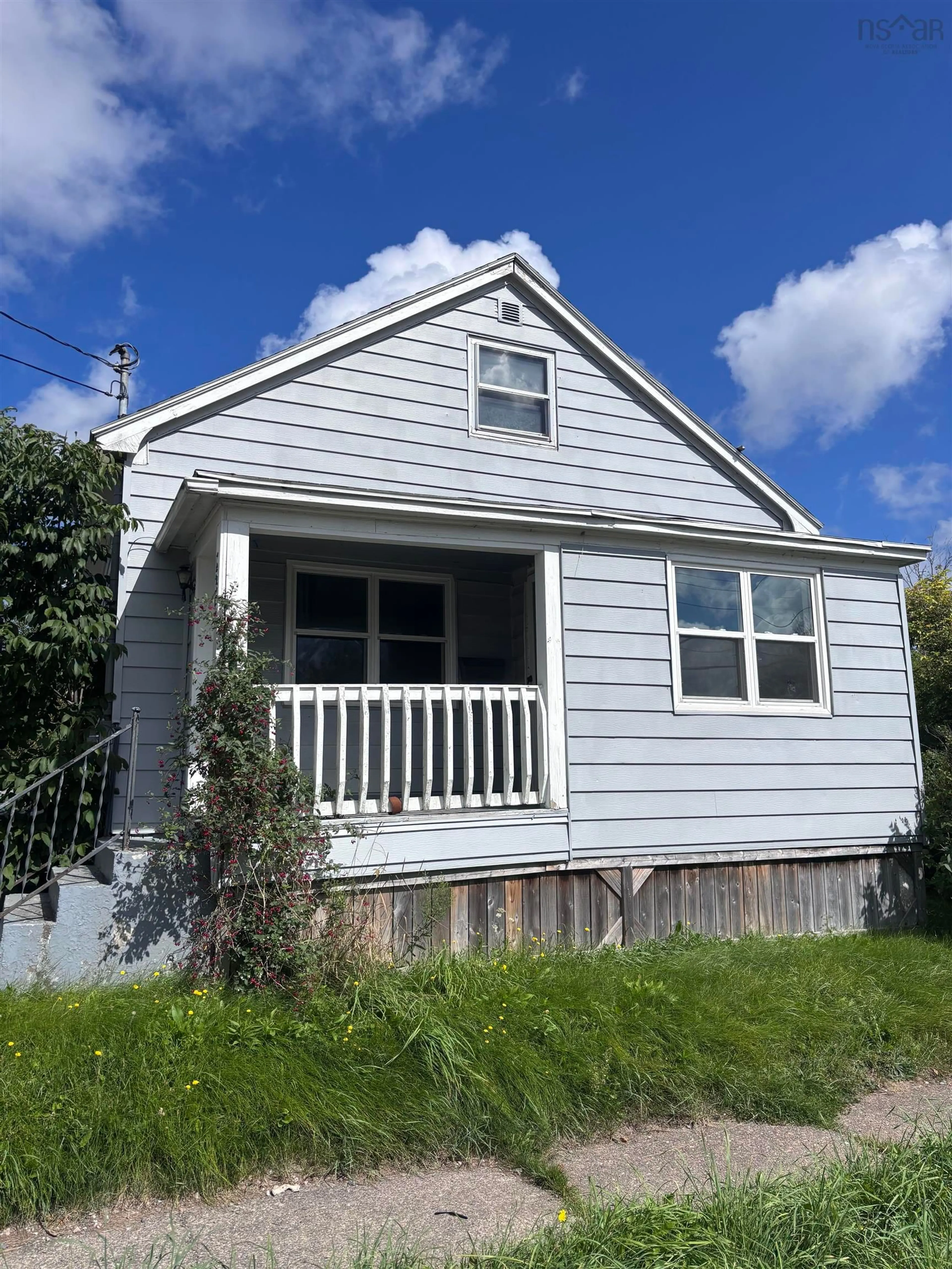 Home with vinyl exterior material, street for 135 Maloney Street, Sydney Ns, B1n 2c7 St, Sydney Nova Scotia B1N 2C7