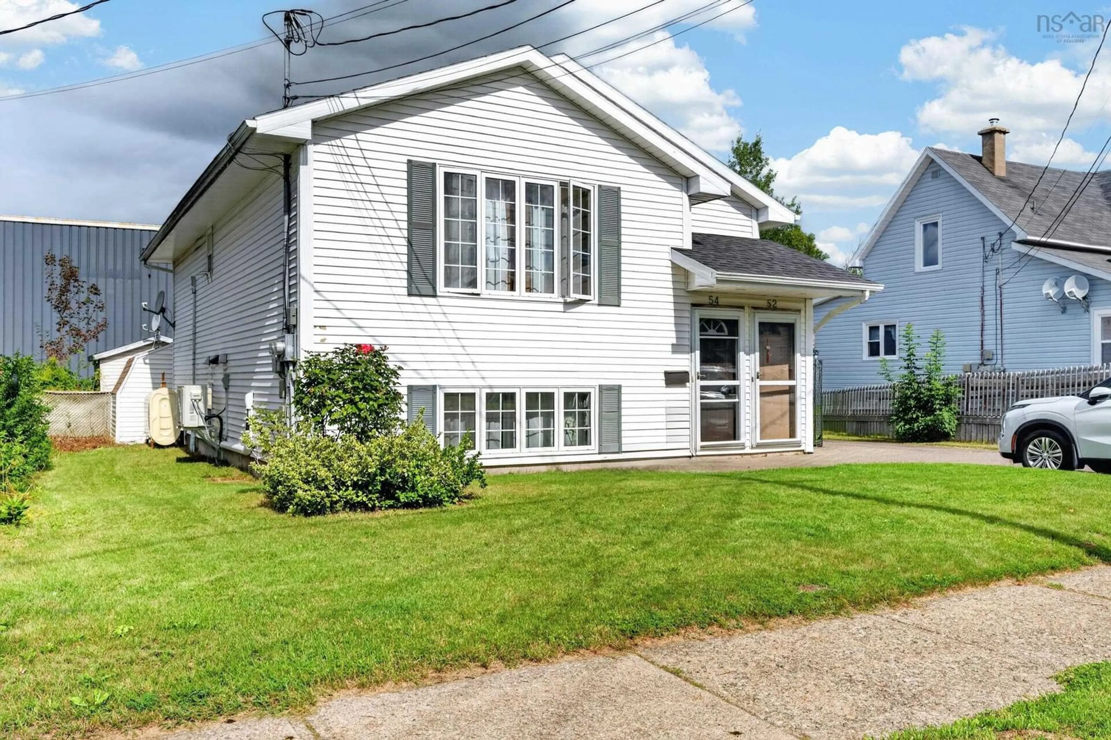 Home with vinyl exterior material, street for 52 Richardson Street Ave, Sydney Nova Scotia B1S 2Z2