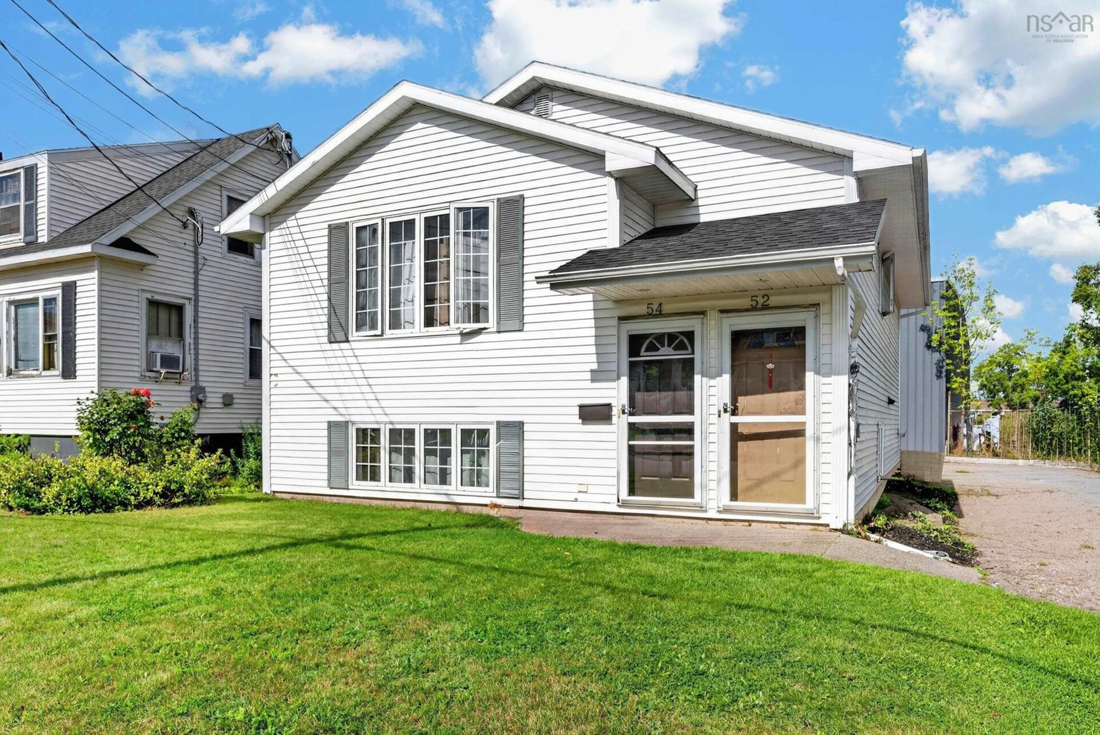 Home with vinyl exterior material, street for 52 Richardson Street Ave, Sydney Nova Scotia B1S 2Z2