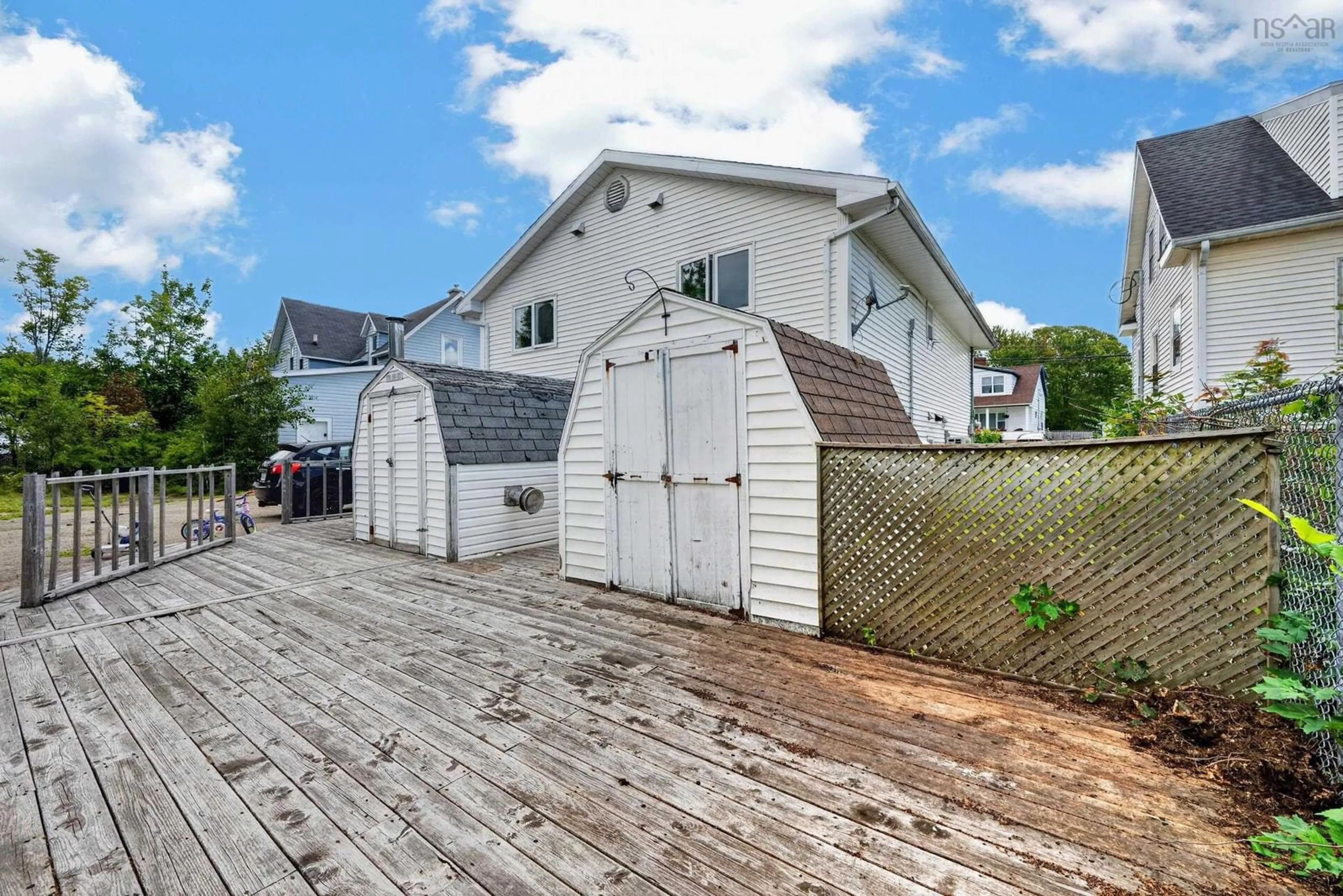 A pic from outside/outdoor area/front of a property/back of a property/a pic from drone, street for 52 Richardson Street Ave, Sydney Nova Scotia B1S 2Z2