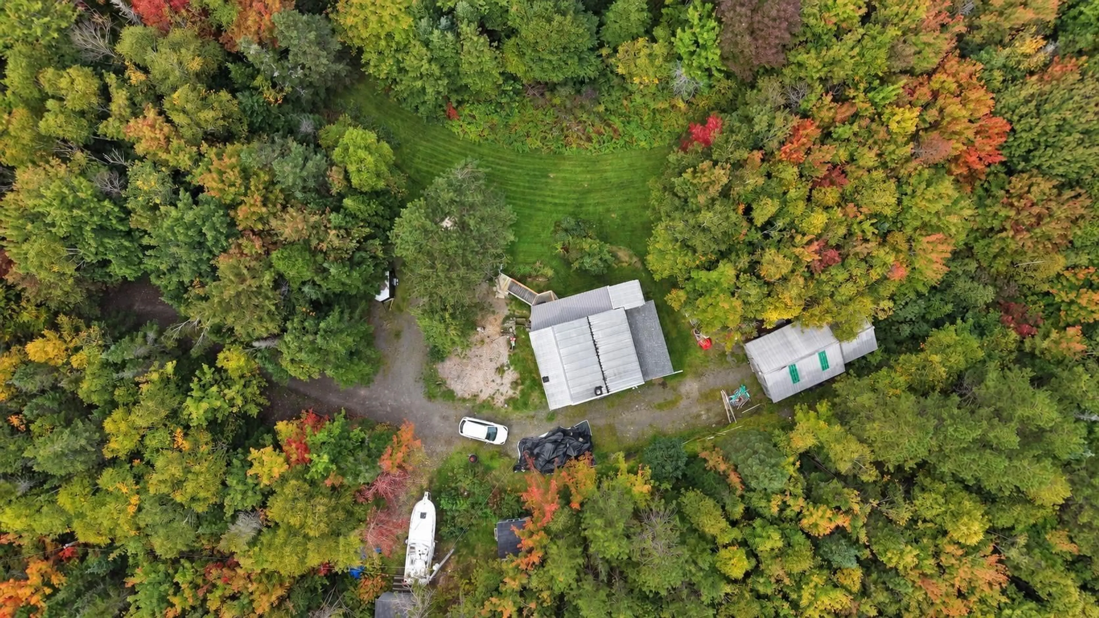 A pic from outside/outdoor area/front of a property/back of a property/a pic from drone, forest/trees view for 837 Meadow Rd, North River Nova Scotia B0E 1B0