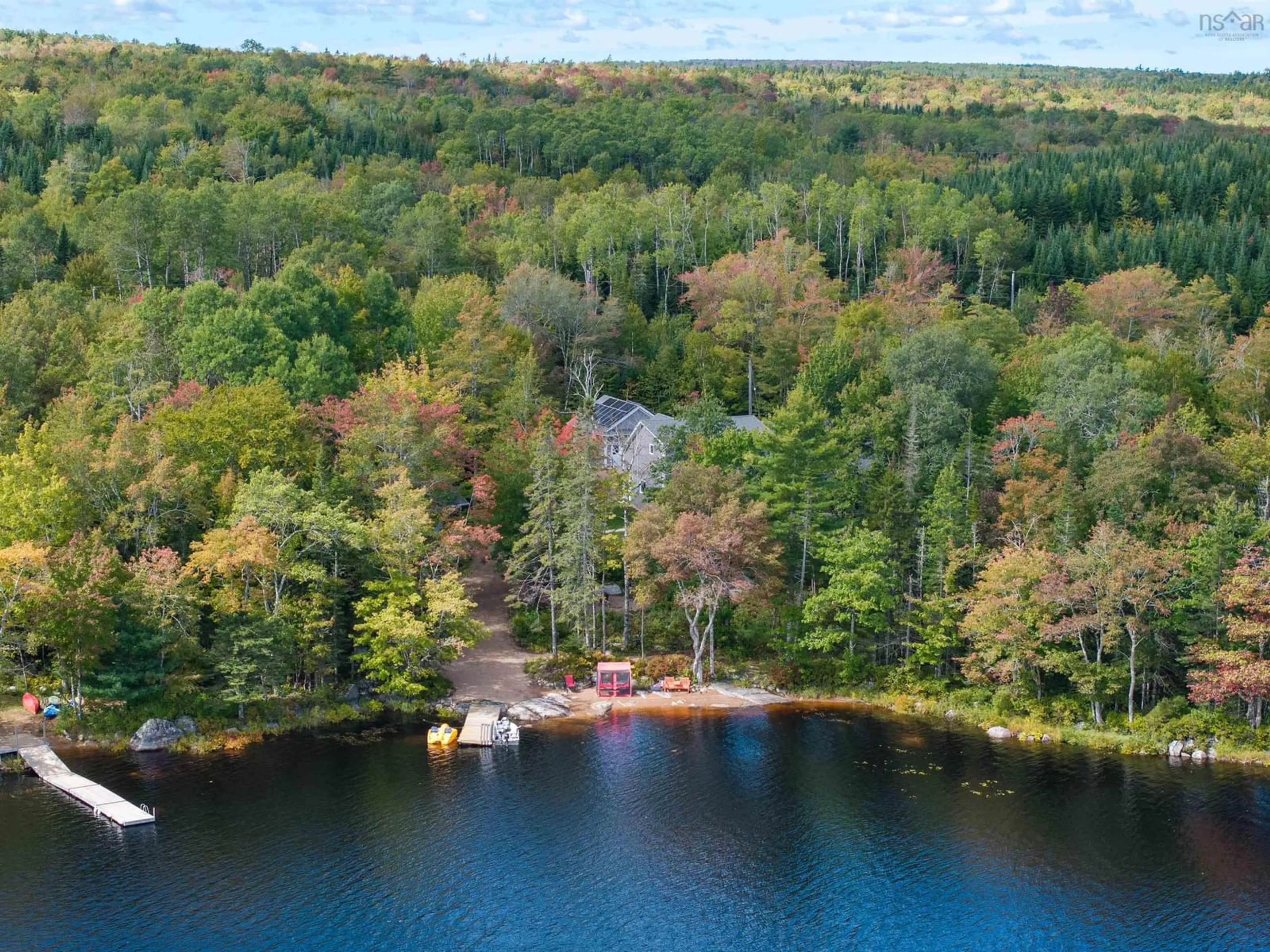 A pic from outside/outdoor area/front of a property/back of a property/a pic from drone, water/lake/river/ocean view for 60 Skippers Lane, Harriston Nova Scotia B0J 2M0