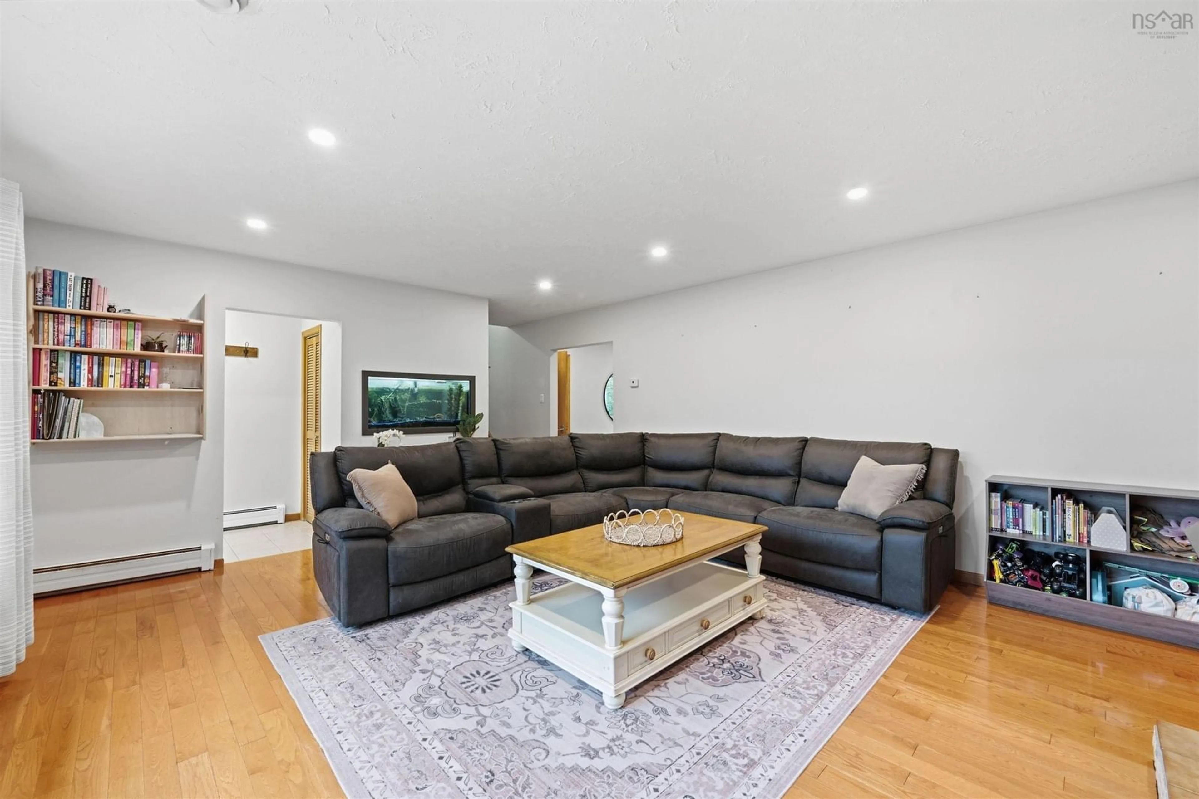 Living room with furniture, wood/laminate floor for 21 Kimara Dr, Hammonds Plains Nova Scotia B3Z 1H9