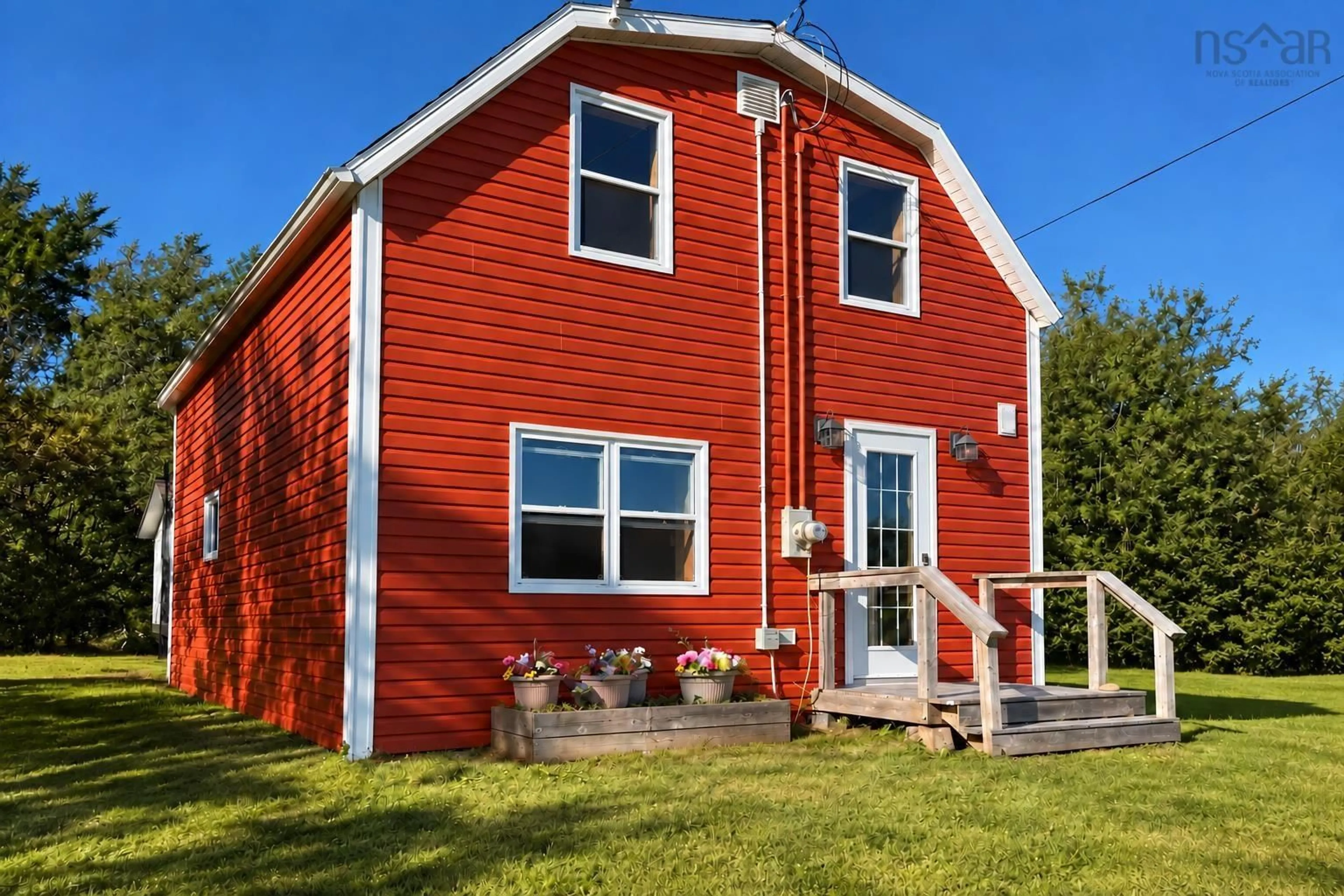 Home with vinyl exterior material, building for 96 Ocean View Drive, Neils Harbour Nova Scotia B0C 1G0