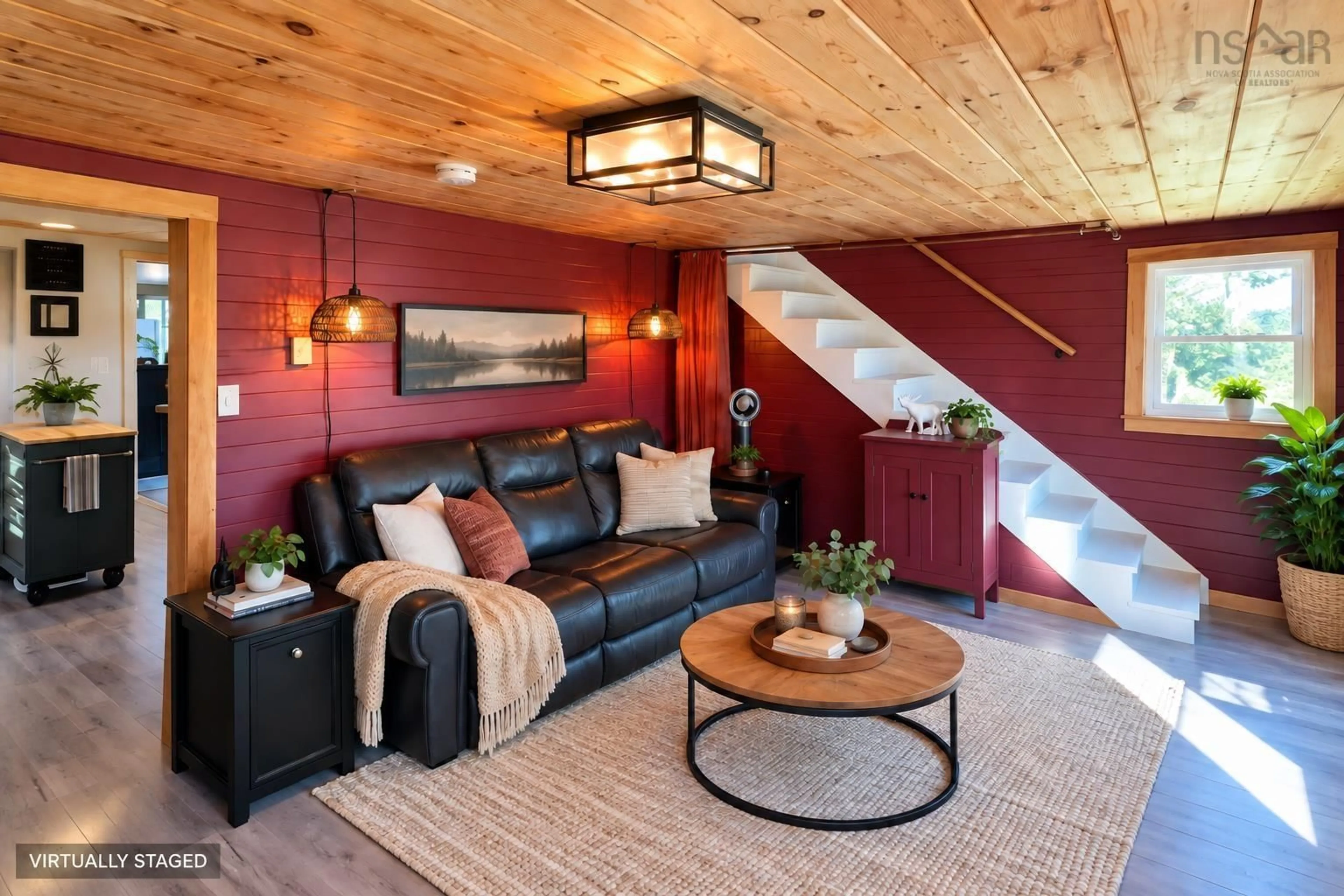 Living room with furniture, wood/laminate floor for 96 Ocean View Drive, Neils Harbour Nova Scotia B0C 1G0