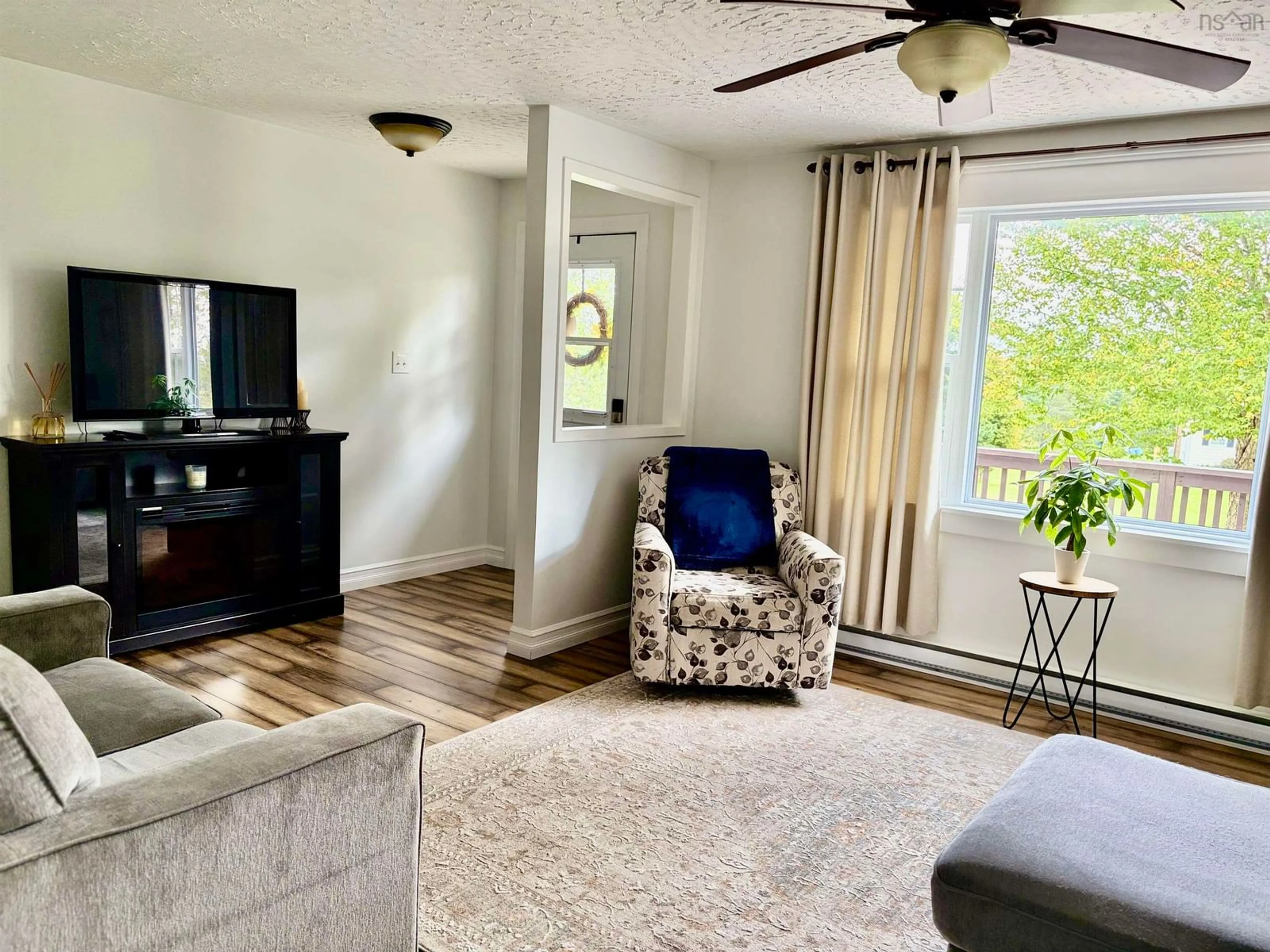 Living room with furniture, unknown for 43 King Grove Rd, Millville Nova Scotia B1Y 2E4