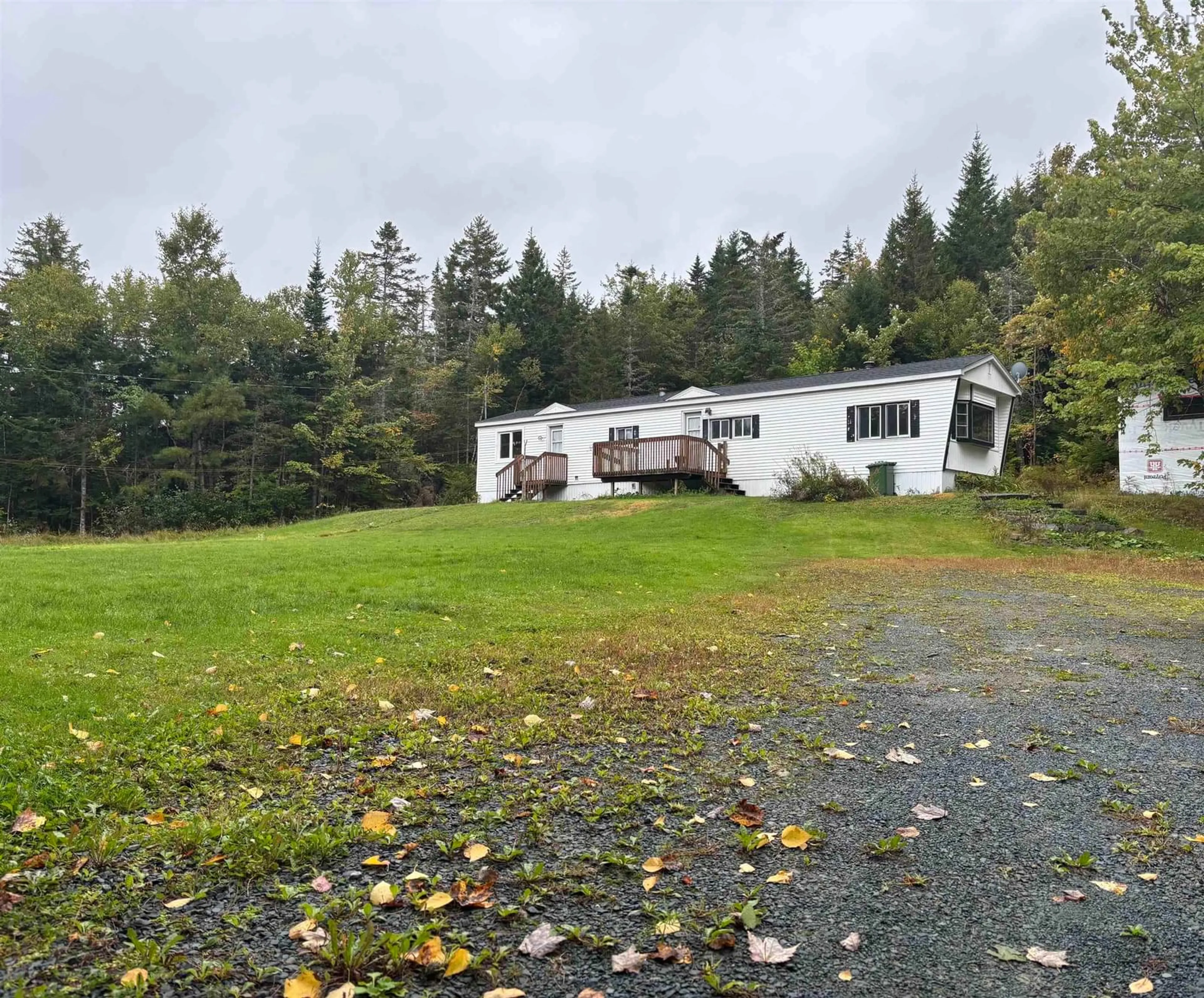 A pic from outside/outdoor area/front of a property/back of a property/a pic from drone, unknown for 1126 Myra Rd, Porters Lake Nova Scotia B3E 1G9