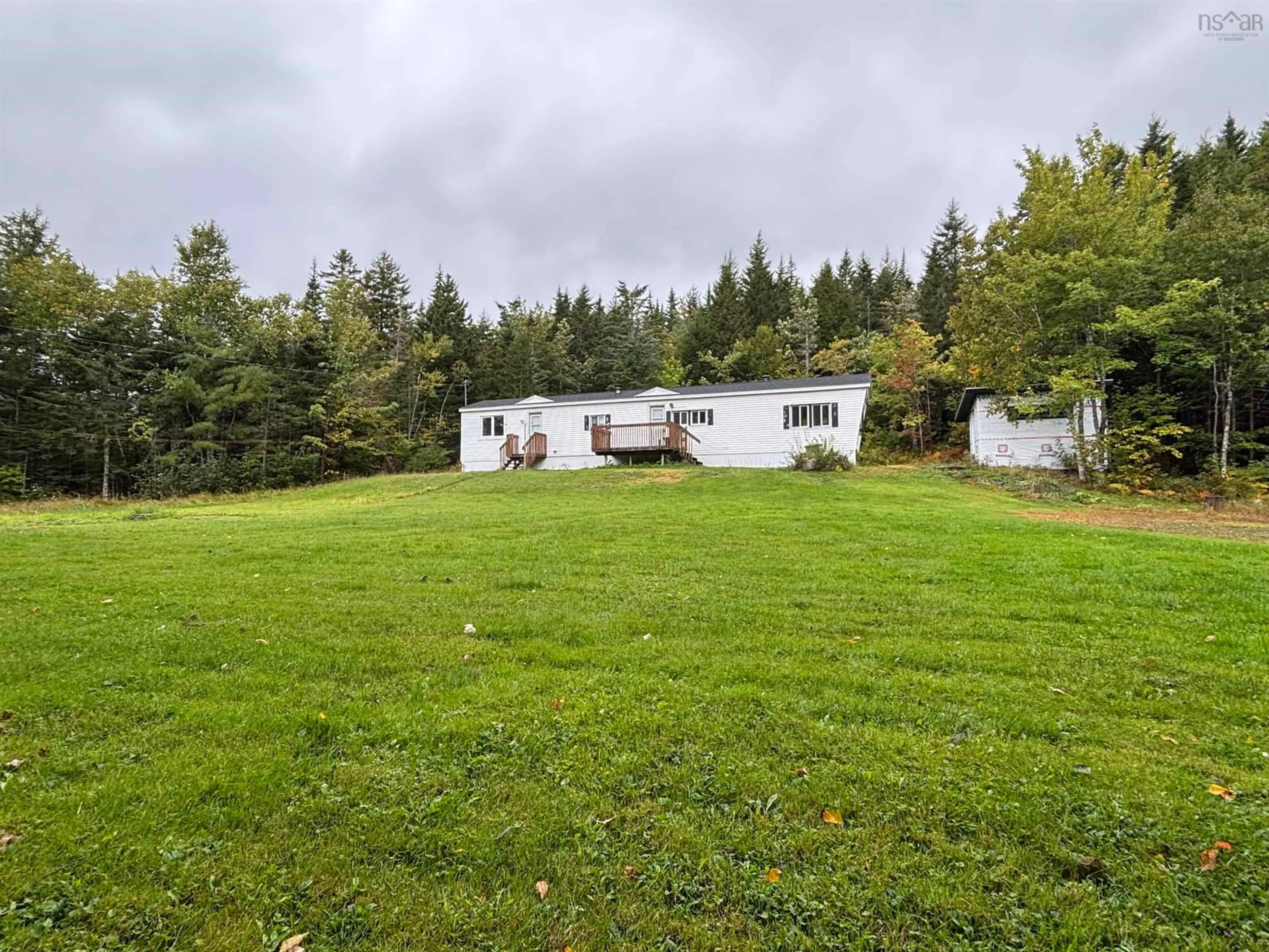 A pic from outside/outdoor area/front of a property/back of a property/a pic from drone, unknown for 1126 Myra Rd, Porters Lake Nova Scotia B3E 1G9