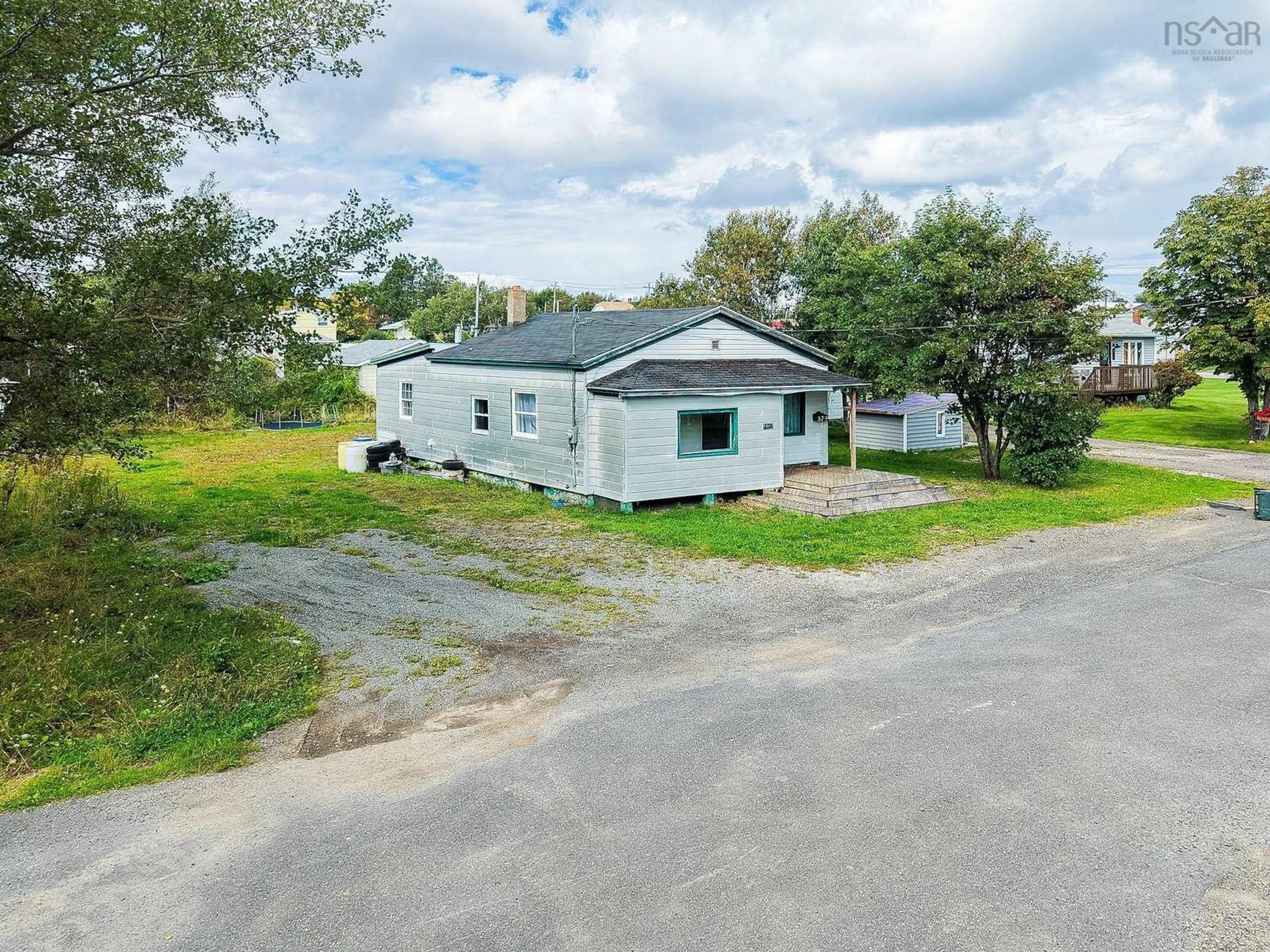 A pic from outside/outdoor area/front of a property/back of a property/a pic from drone, street for 379 Ripley St, New Waterford Nova Scotia B1H 2Z7