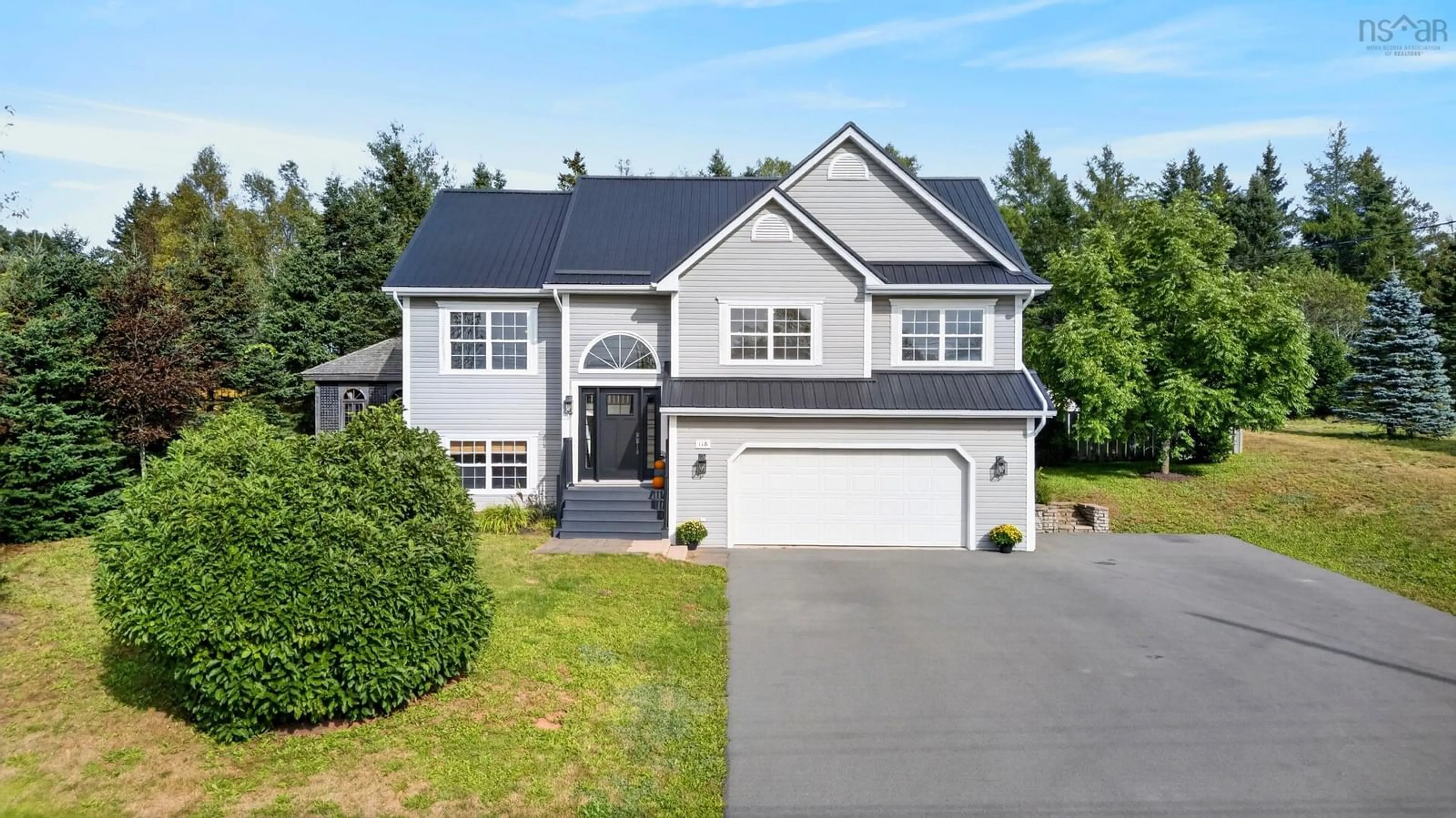 Home with vinyl exterior material, street for 118 Edgehill Dr, Valley Nova Scotia B6L 3K3