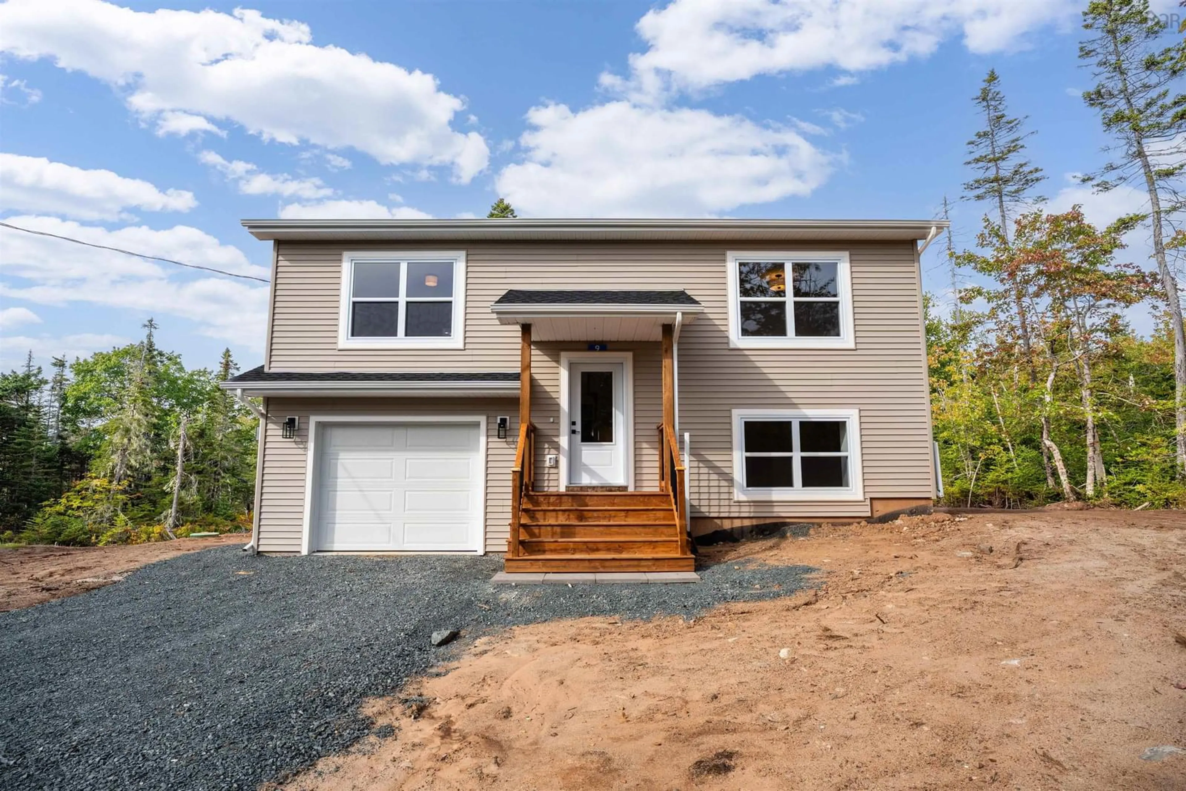 Home with vinyl exterior material, street for 9 Surf Dr, Whites Lake Nova Scotia B3T 1W4