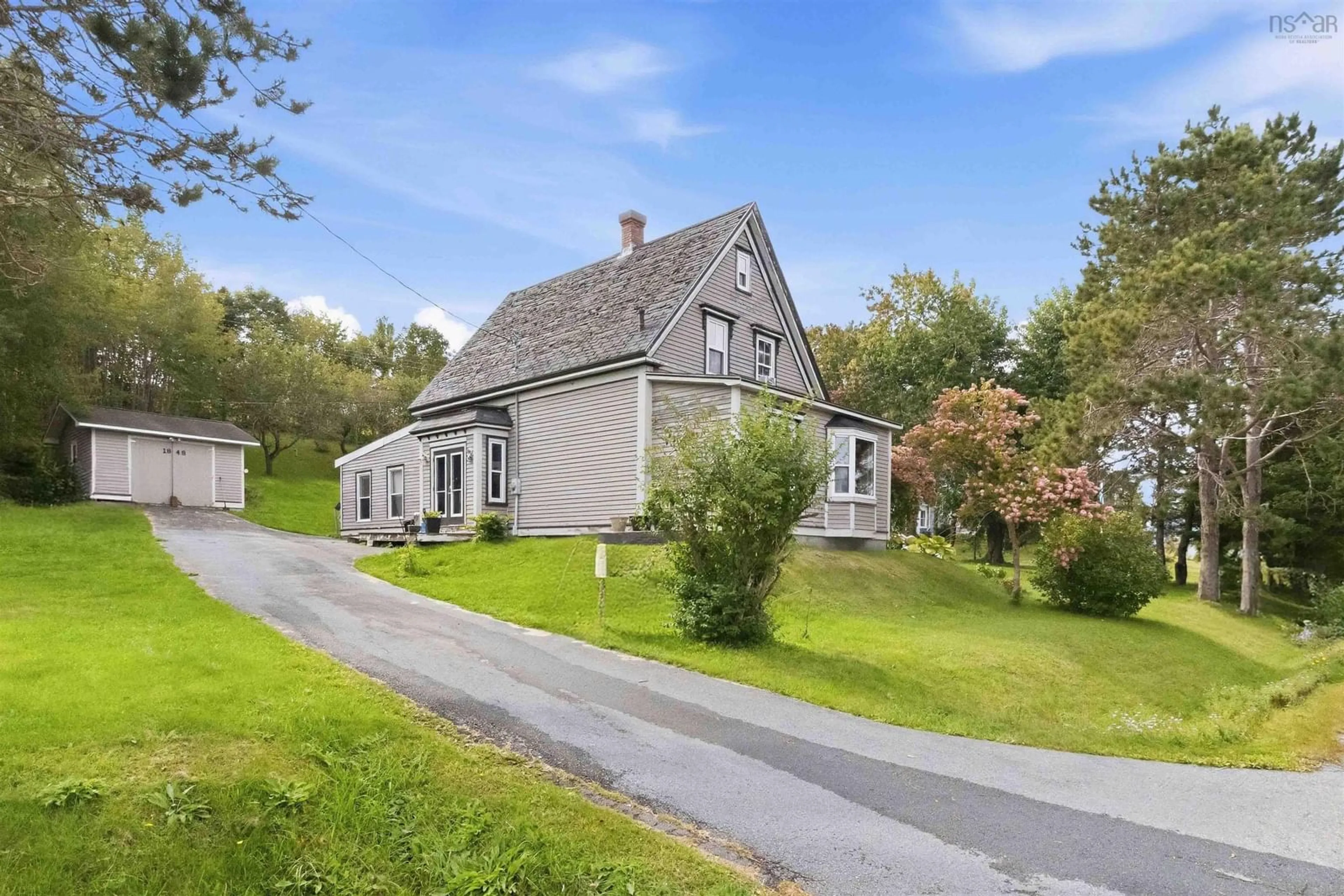 A pic from outside/outdoor area/front of a property/back of a property/a pic from drone, street for 1848 Highway 331, West Lahave Nova Scotia B0R 1G0