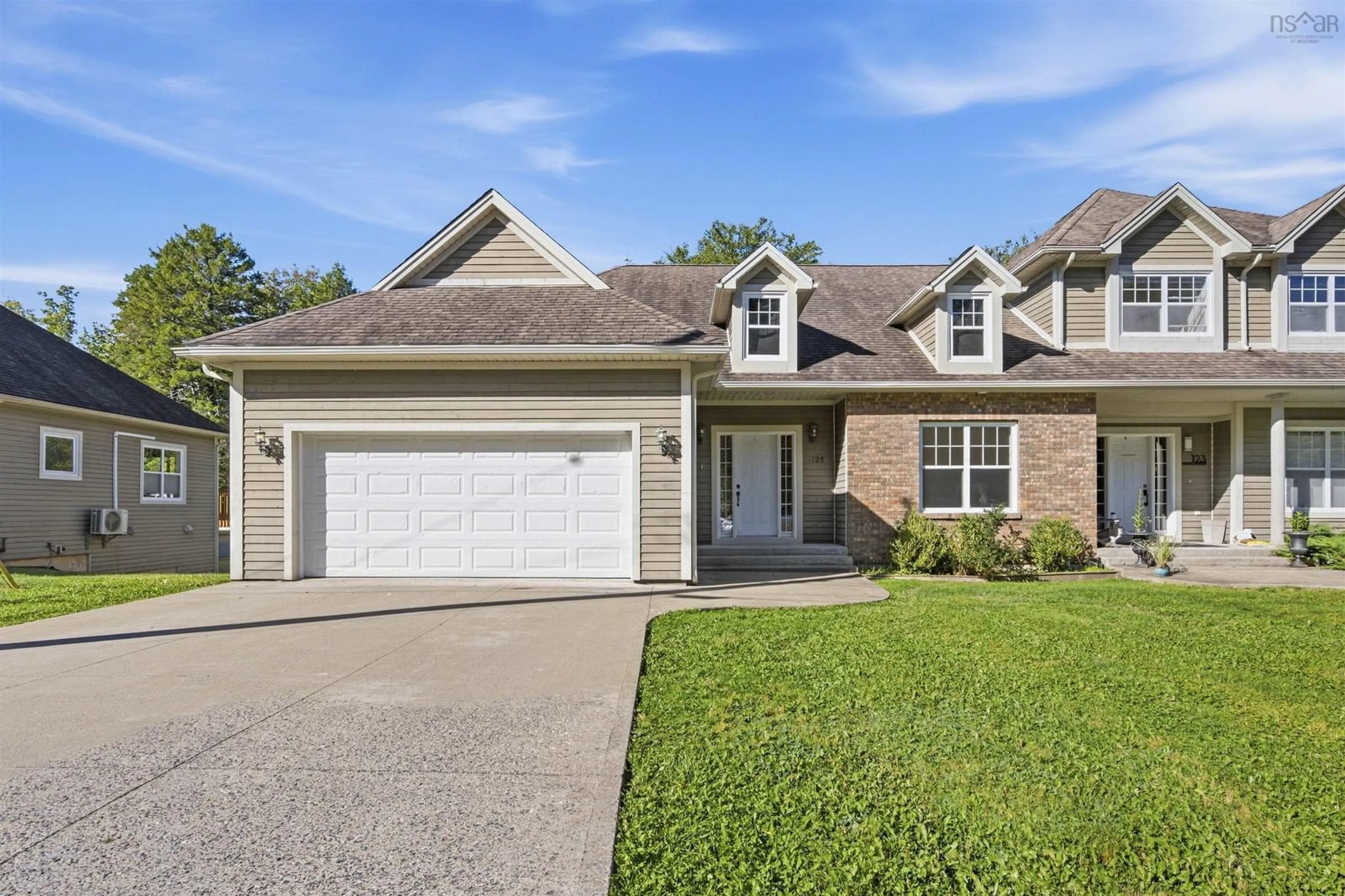 Home with brick exterior material, street for 125 Carnoustie Dr, Hammonds Plains Nova Scotia B4B 0E5