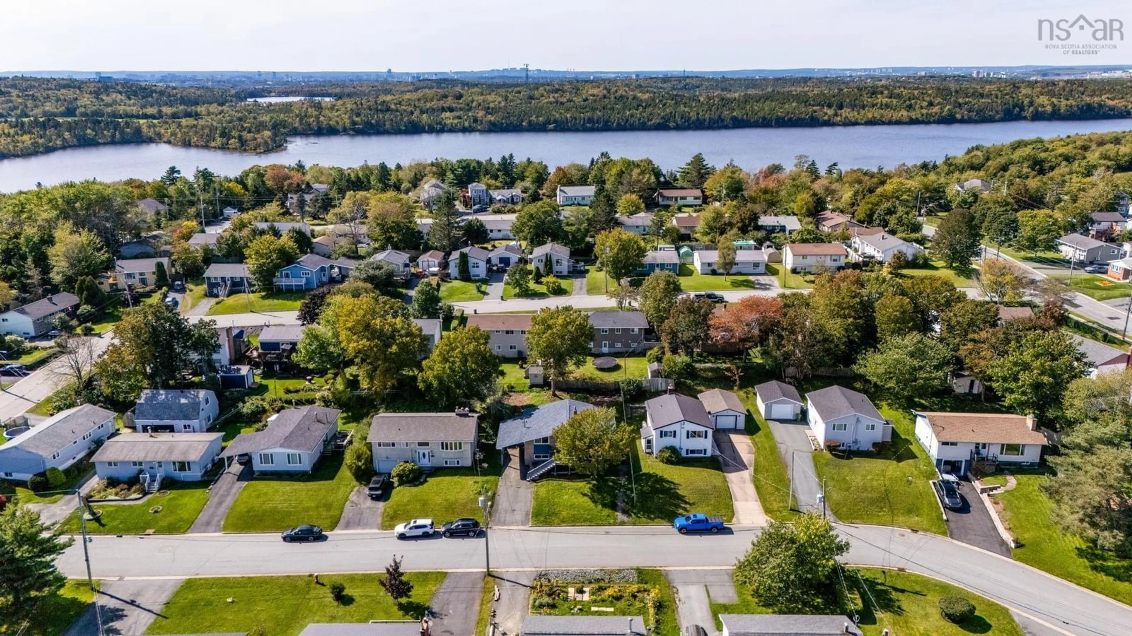 A pic from outside/outdoor area/front of a property/back of a property/a pic from drone, water/lake/river/ocean view for 33 Terra Nova Ave, Lake Loon Nova Scotia B2W 3P9