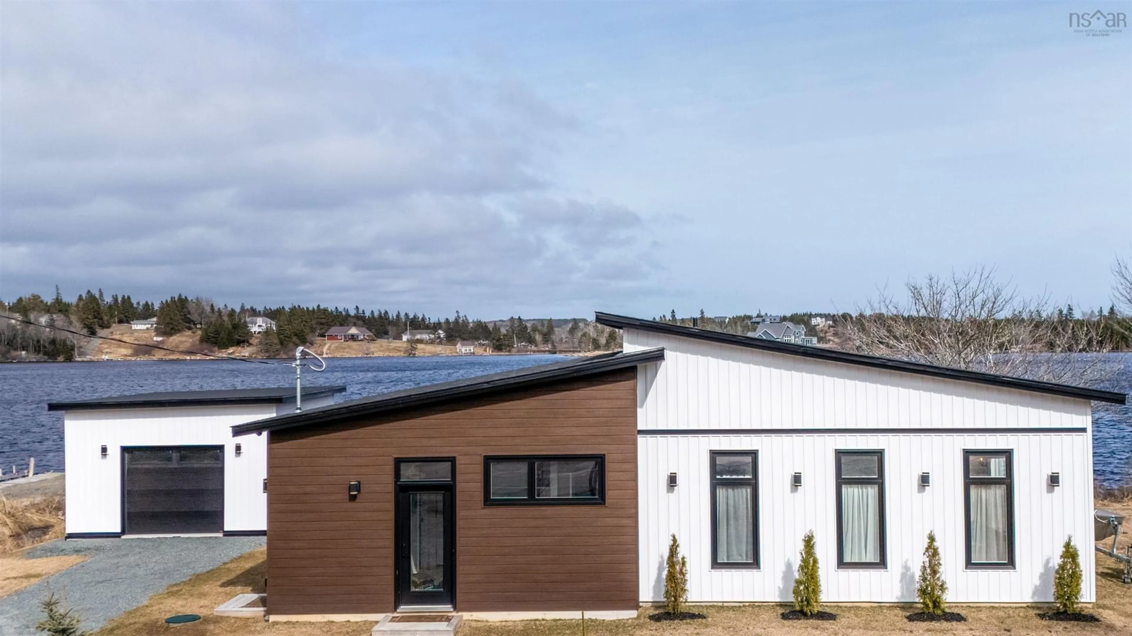 Home with vinyl exterior material, water/lake/river/ocean view for 1612 Crowell Rd, East Lawrencetown Nova Scotia B2Z 1N5
