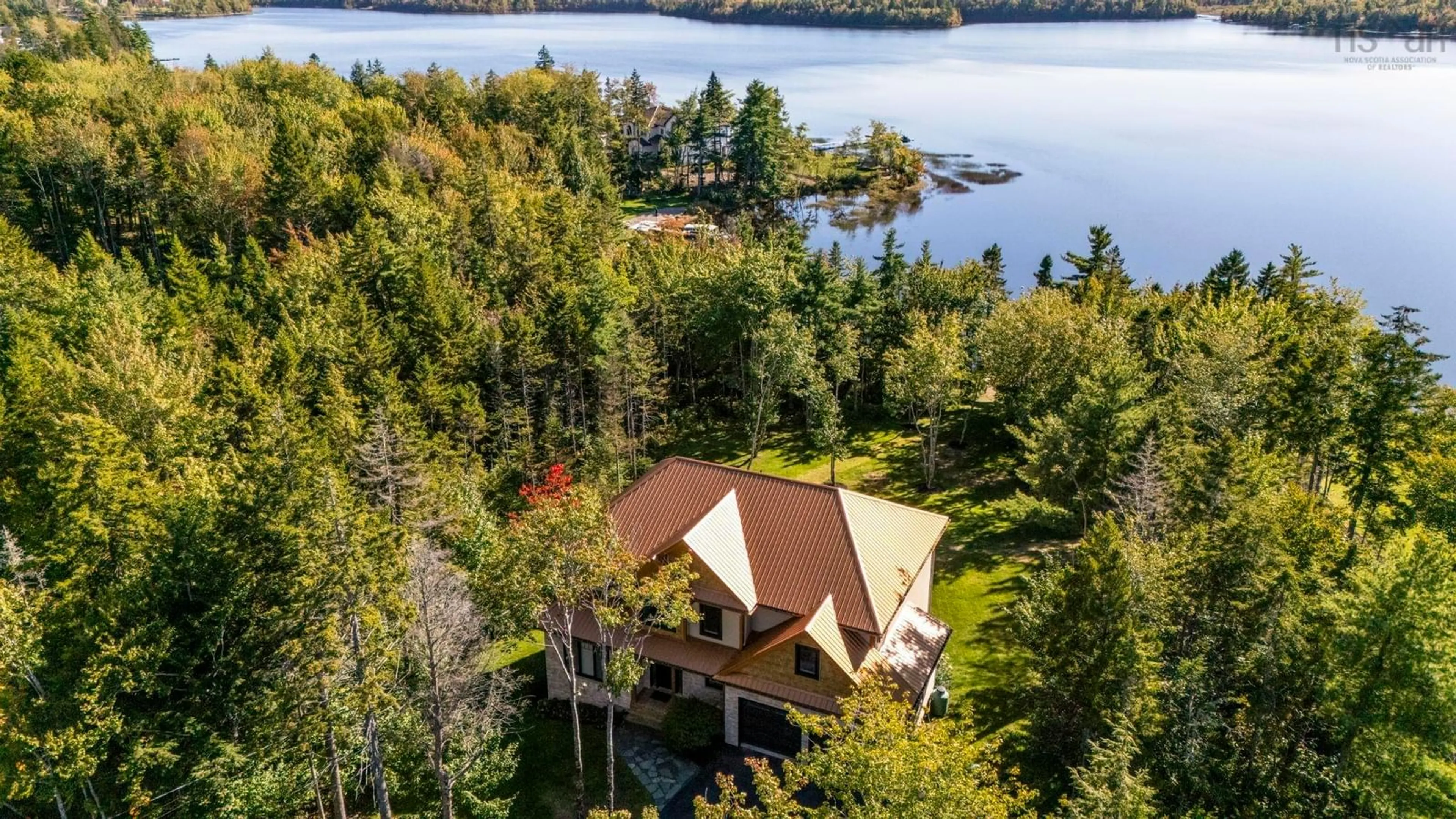 A pic from outside/outdoor area/front of a property/back of a property/a pic from drone, water/lake/river/ocean view for 460 Mccabe Lake Dr, Middle Sackville Nova Scotia B4E 0N6