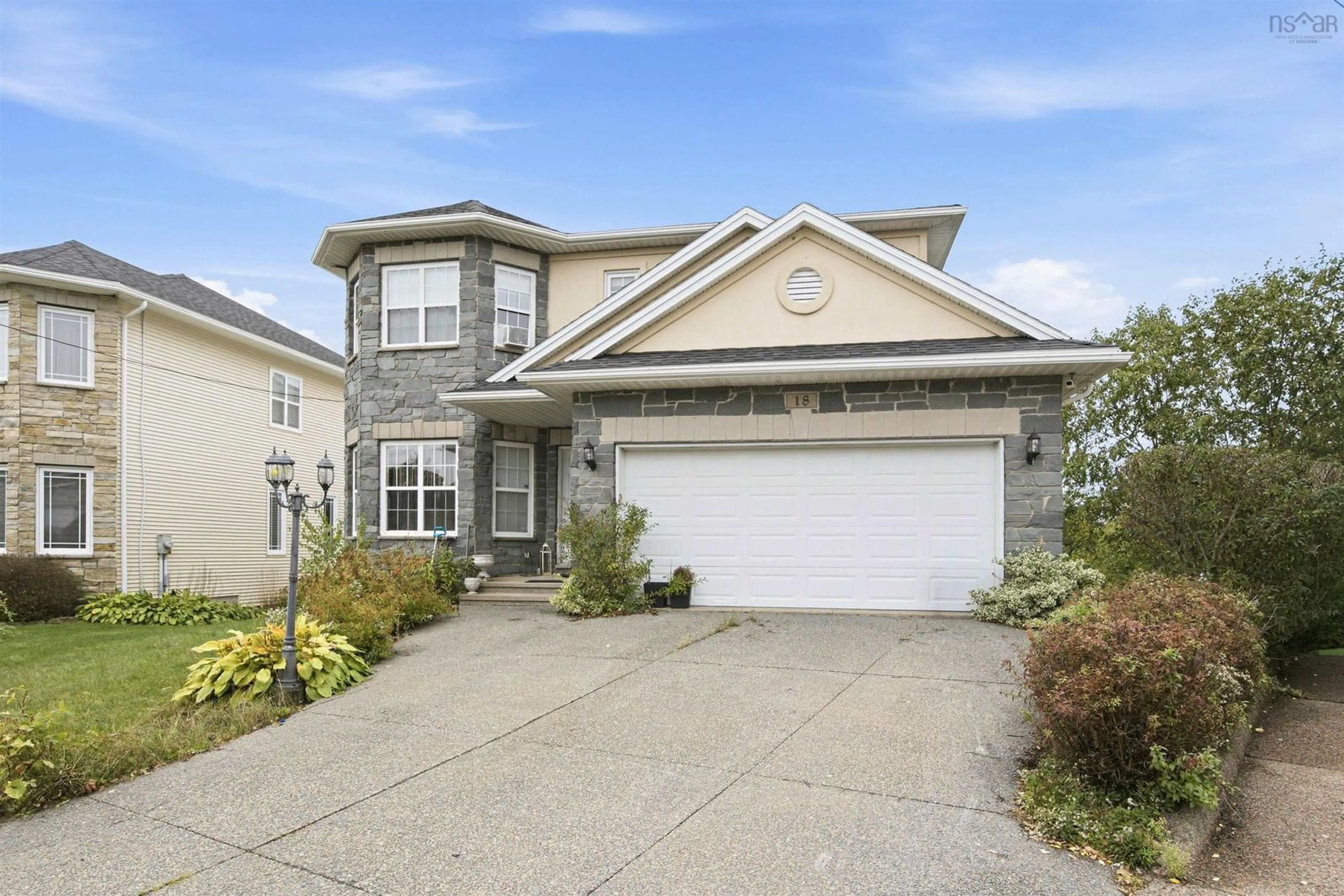 Home with vinyl exterior material, street for 18 Stone Gate Dr, Halifax Nova Scotia B3N 3J2