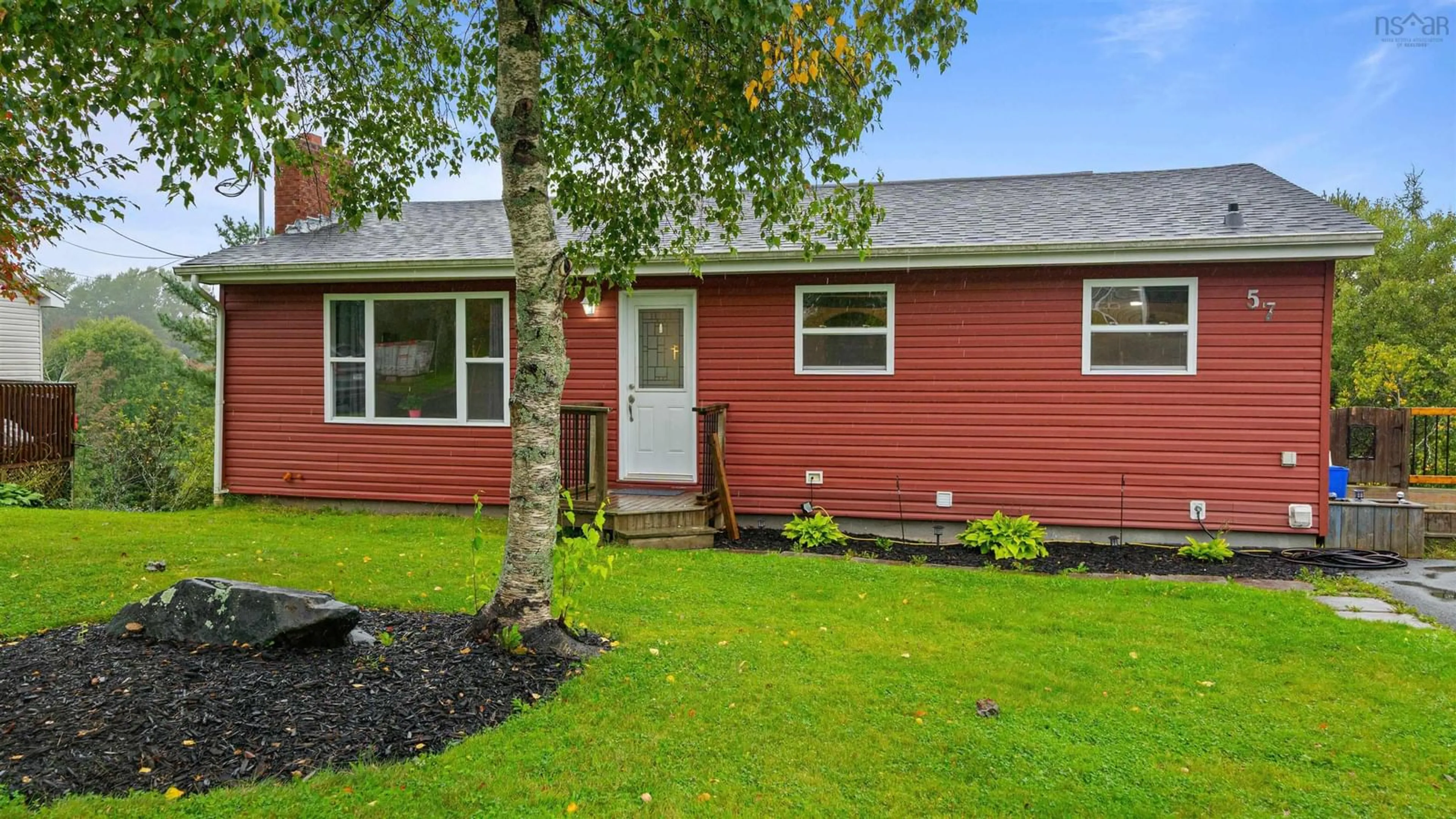 Home with vinyl exterior material, street for 57 Ridge Ave, Lower Sackville Nova Scotia B4C 2L7