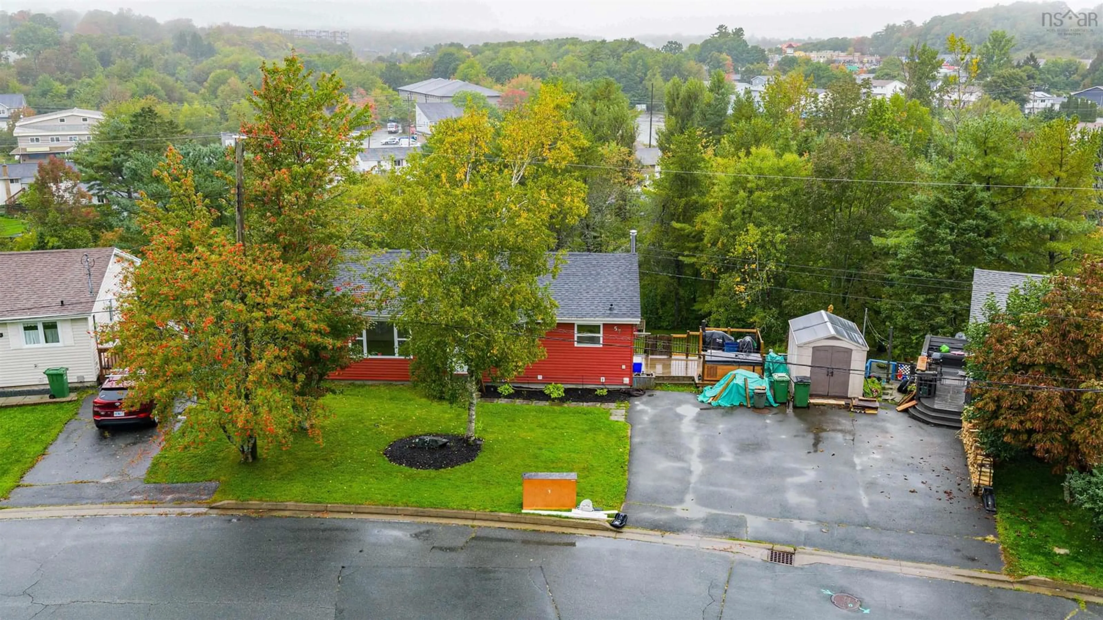 A pic from outside/outdoor area/front of a property/back of a property/a pic from drone, unknown for 57 Ridge Ave, Lower Sackville Nova Scotia B4C 2L7