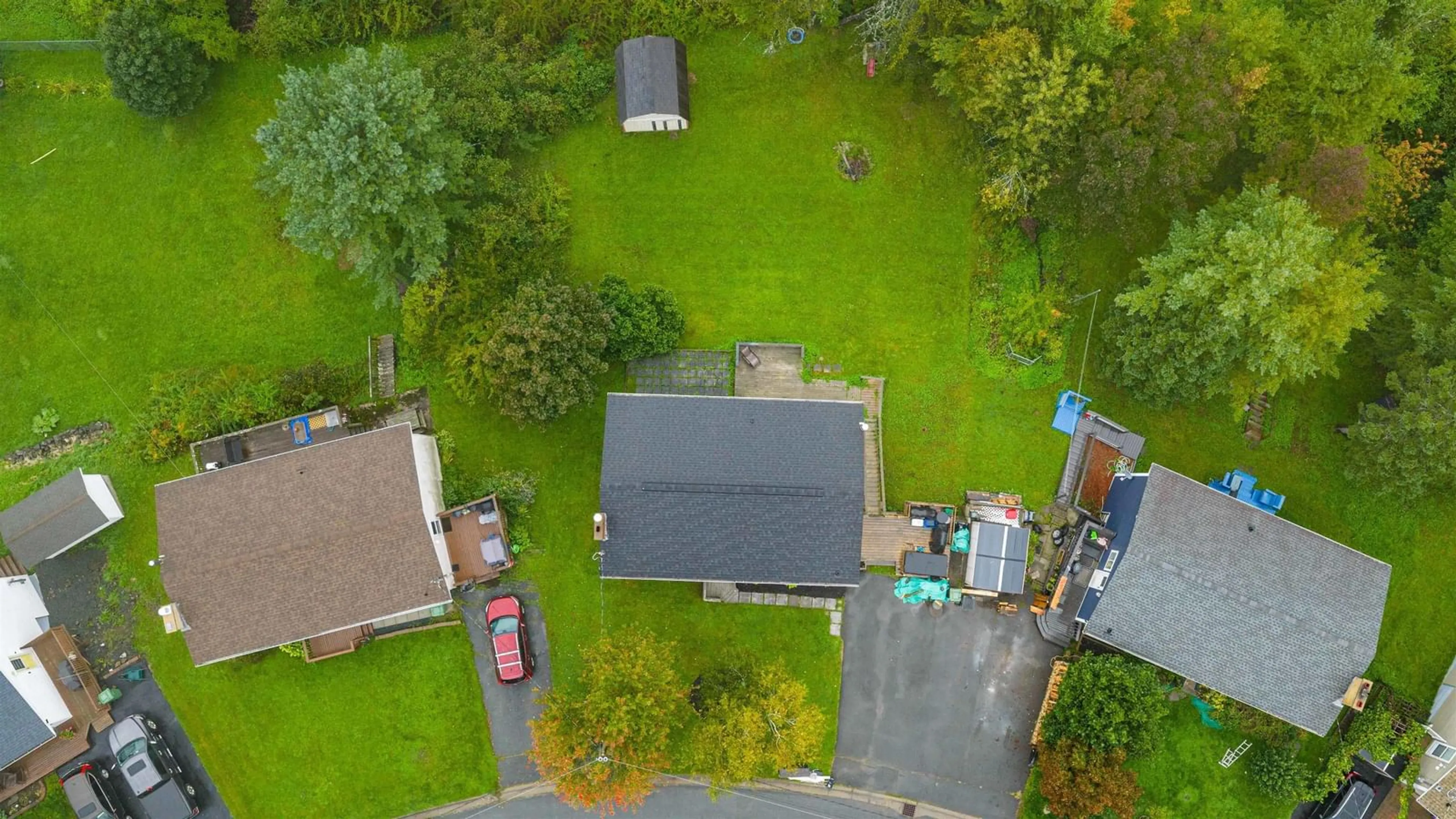 A pic from outside/outdoor area/front of a property/back of a property/a pic from drone, street for 57 Ridge Ave, Lower Sackville Nova Scotia B4C 2L7