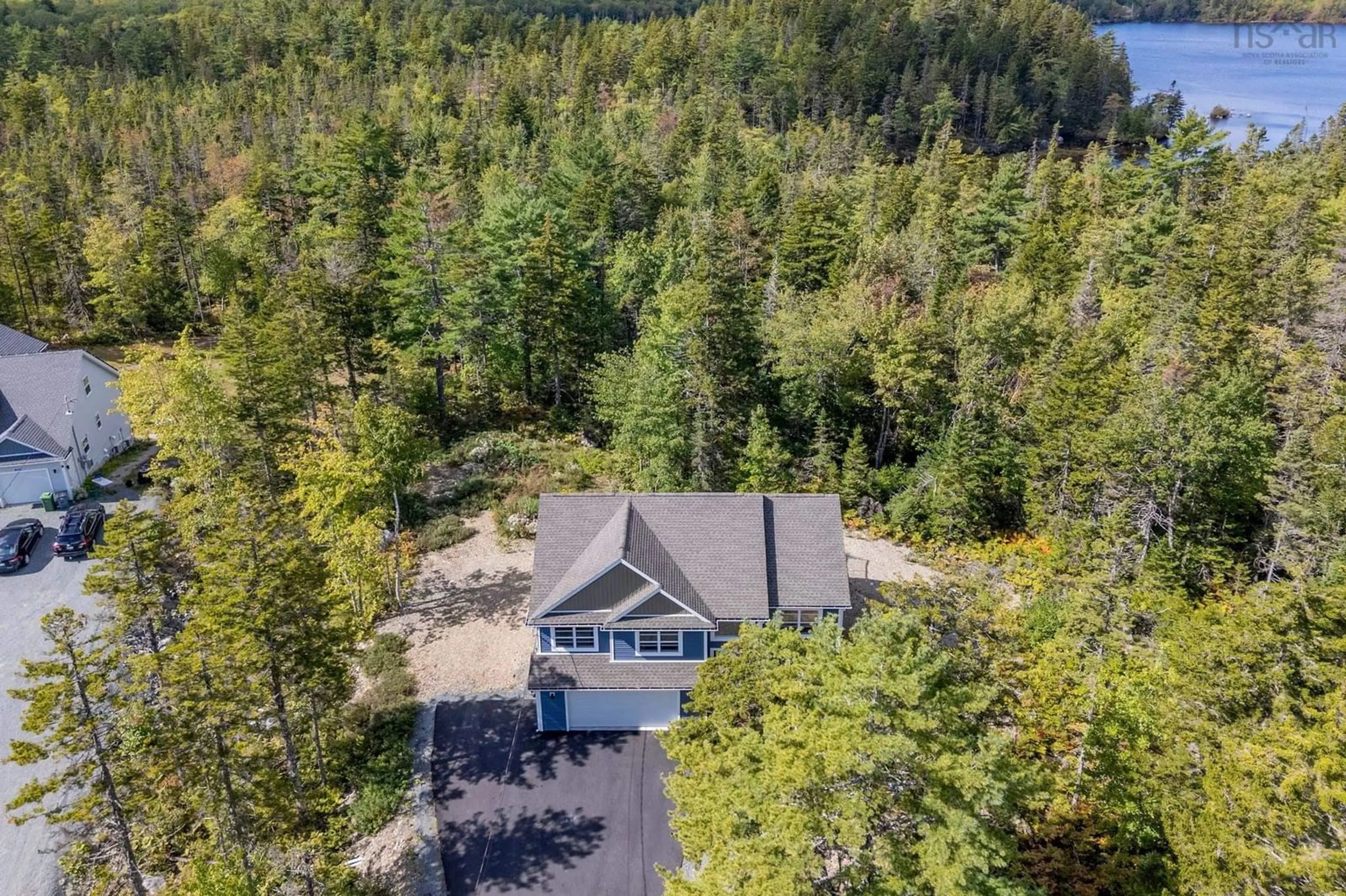 A pic from outside/outdoor area/front of a property/back of a property/a pic from drone, forest/trees view for 42 Whitbury Crt, Upper Tantallon Nova Scotia B3Z 0V4