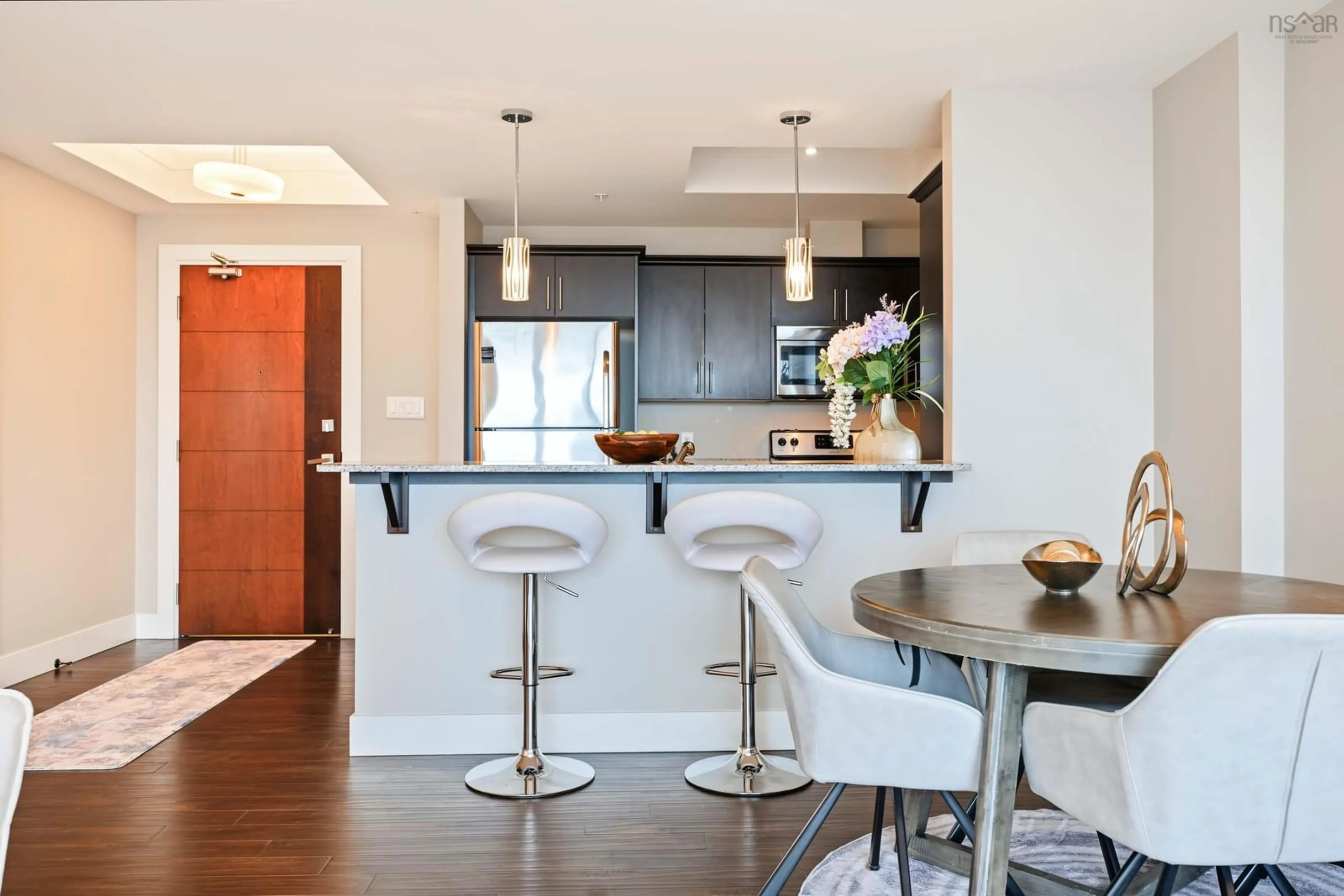 Open concept kitchen, wood/laminate floor for 3471 Dutch Village Rd #1305, Halifax Nova Scotia B3N 0C7