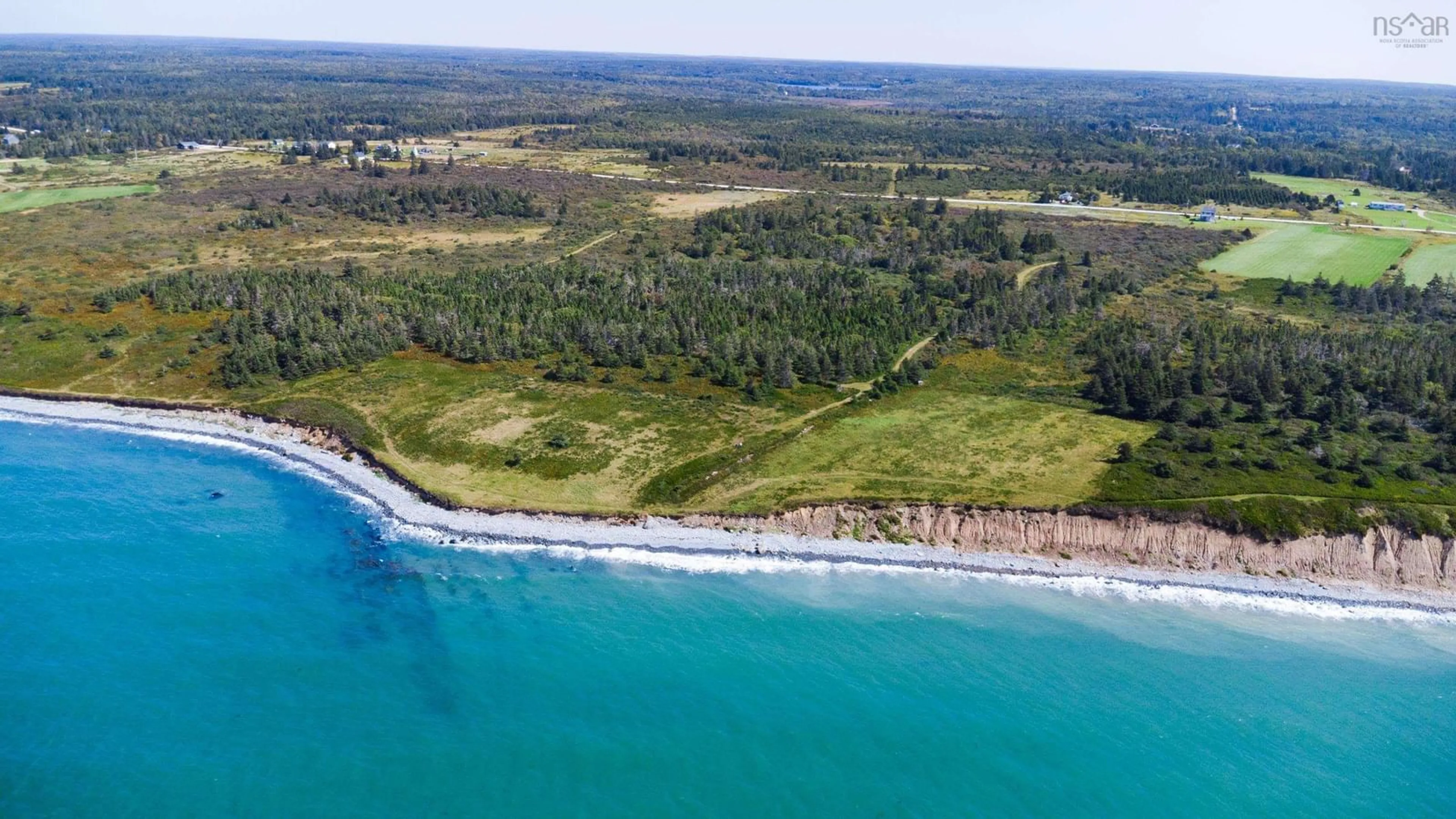 A pic from outside/outdoor area/front of a property/back of a property/a pic from drone, water/lake/river/ocean view for 3827 Highway 1, Beaver River Nova Scotia B5A 4A5