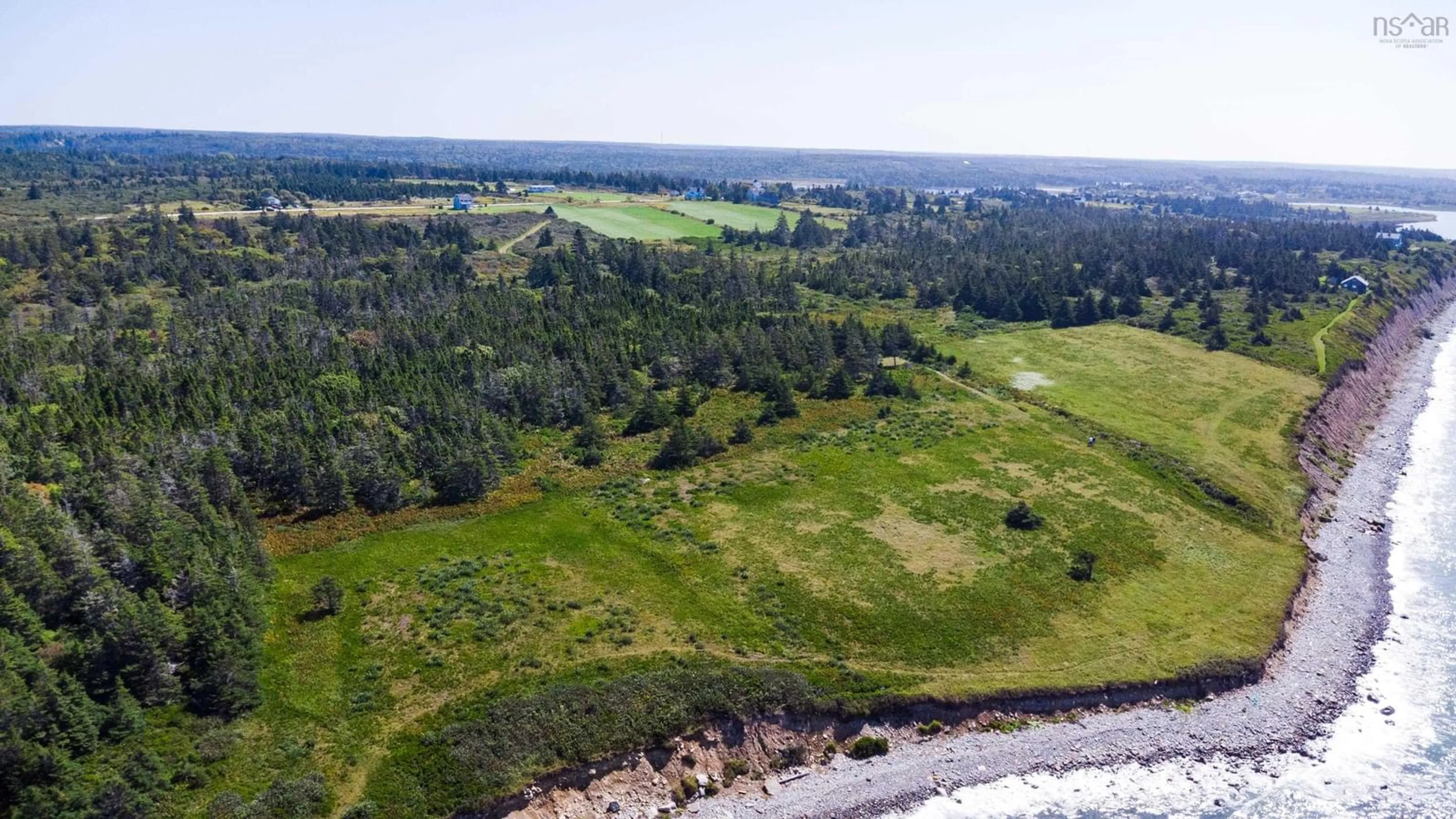 A pic from outside/outdoor area/front of a property/back of a property/a pic from drone, water/lake/river/ocean view for 3827 Highway 1, Beaver River Nova Scotia B5A 4A5