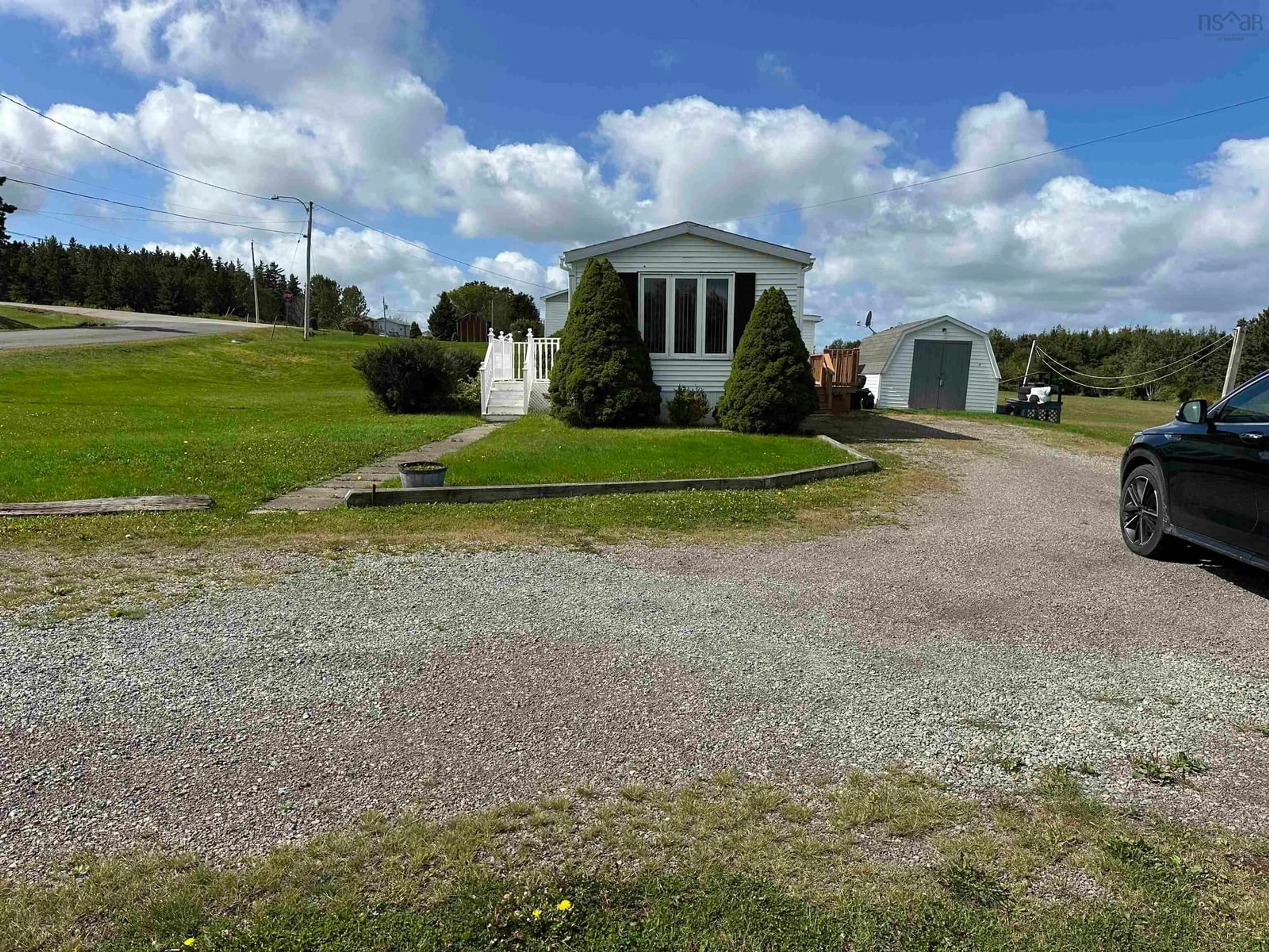 A pic from outside/outdoor area/front of a property/back of a property/a pic from drone, unknown for 19 Old Wharf Rd, Havre Boucher Nova Scotia B0H 1P0