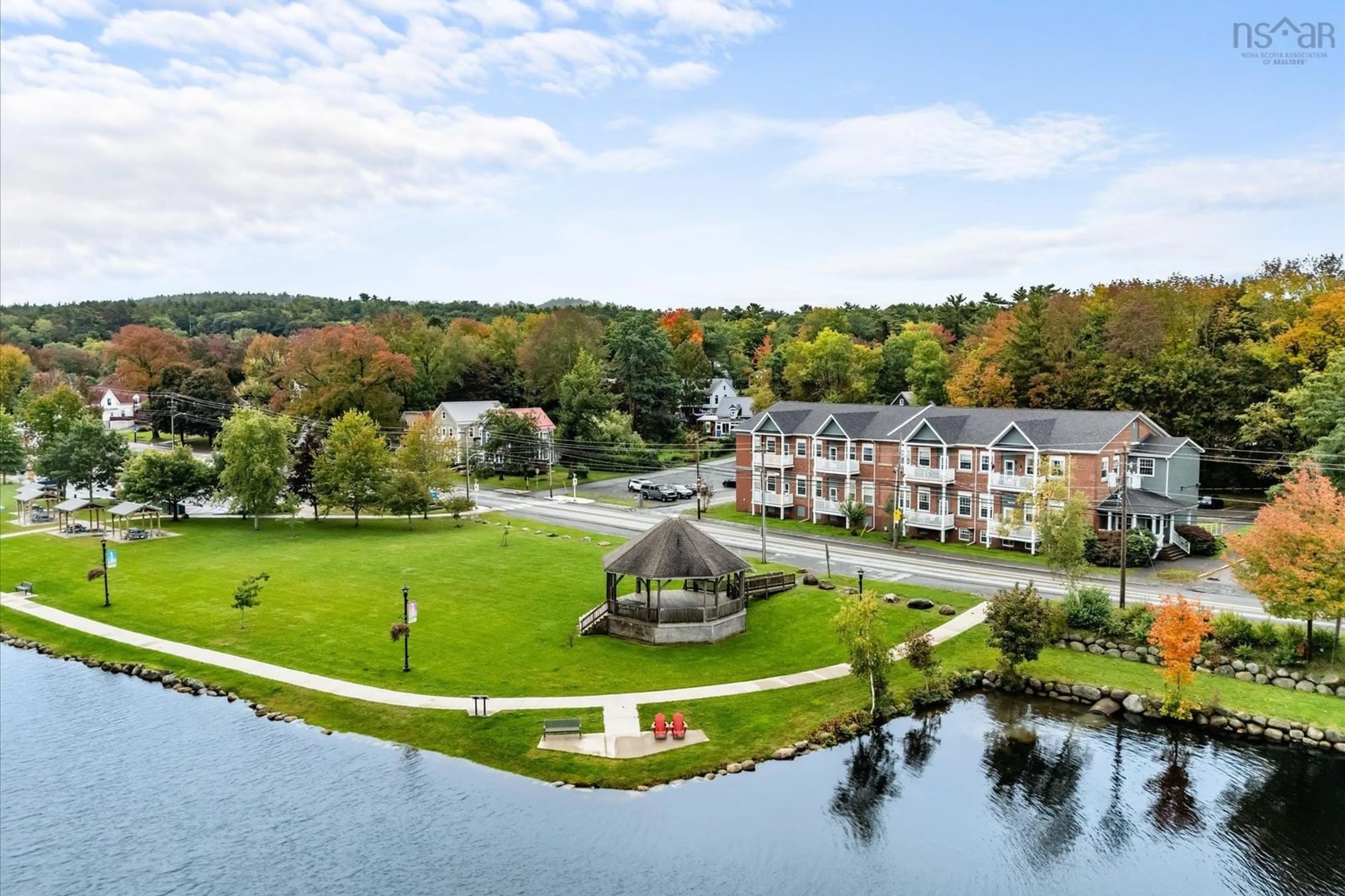 A pic from outside/outdoor area/front of a property/back of a property/a pic from drone, water/lake/river/ocean view for 215 King St #104, Bridgewater Nova Scotia B4V 1A6