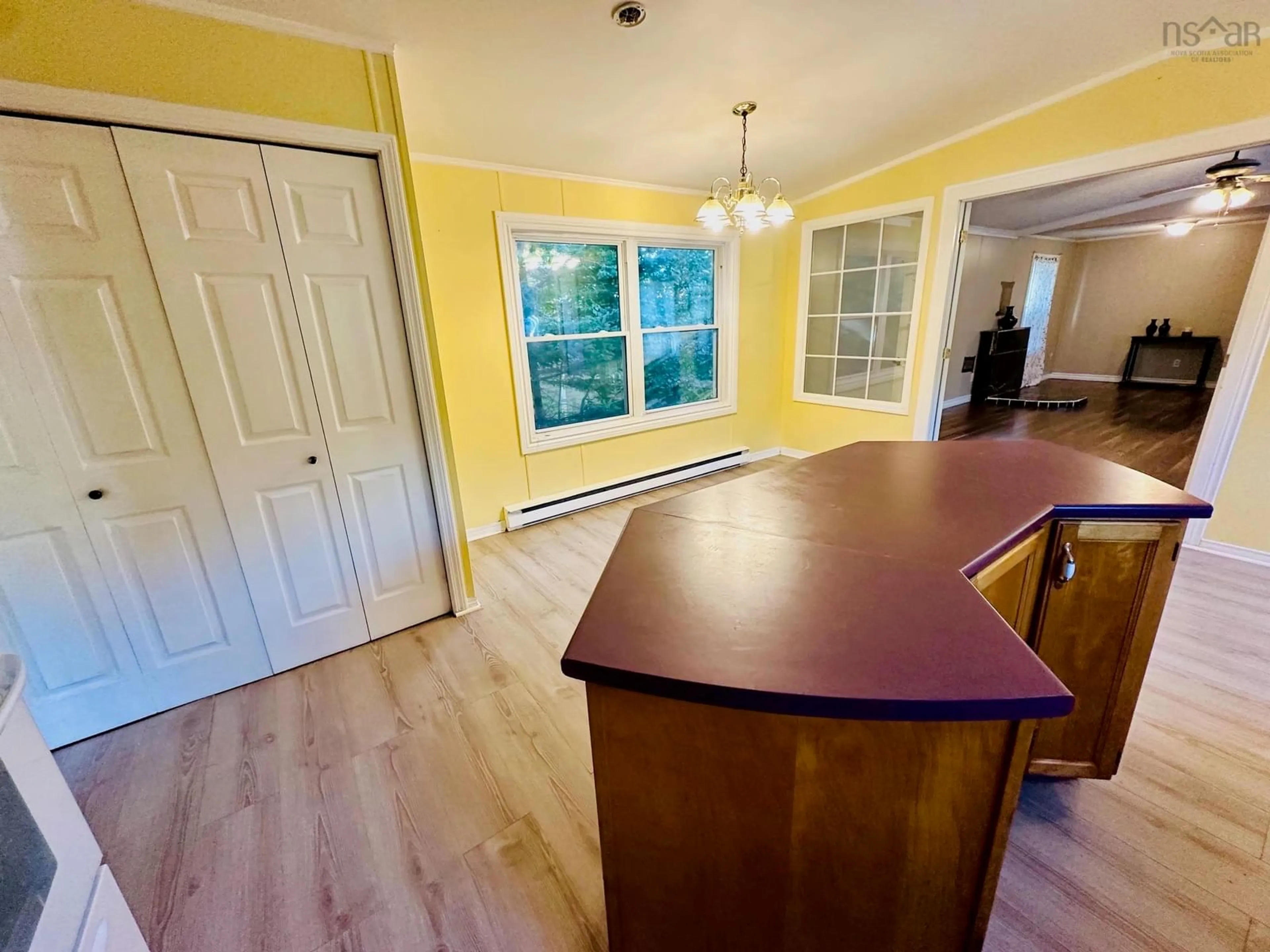 Open concept kitchen, wood/laminate floor for Brian St., East Preston, Ns #97, East Preston Nova Scotia B2Z 1H3