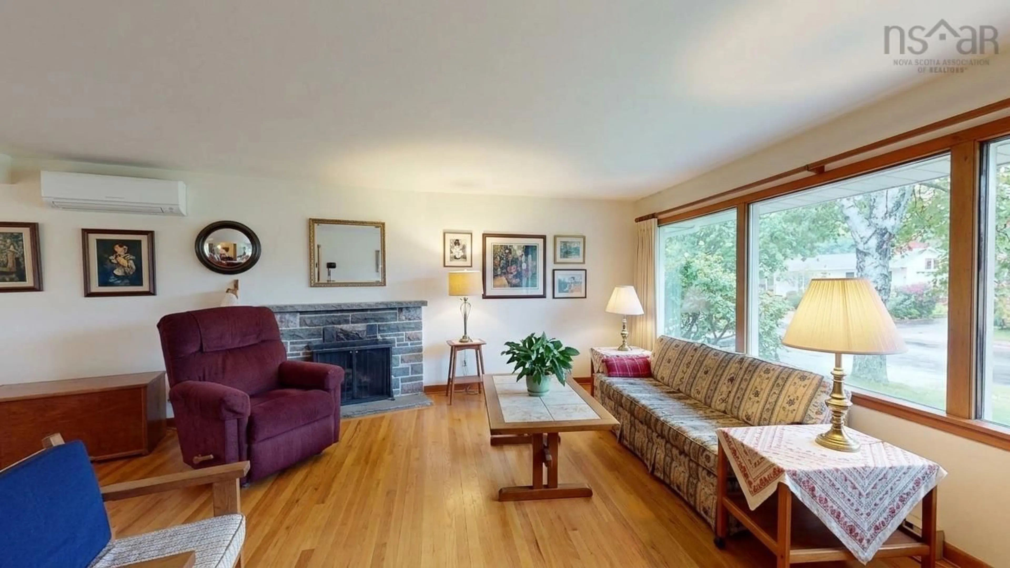 Living room with furniture, wood/laminate floor for 33 Anderson Street, Dartmouth Nova Scotia B2W 2T7