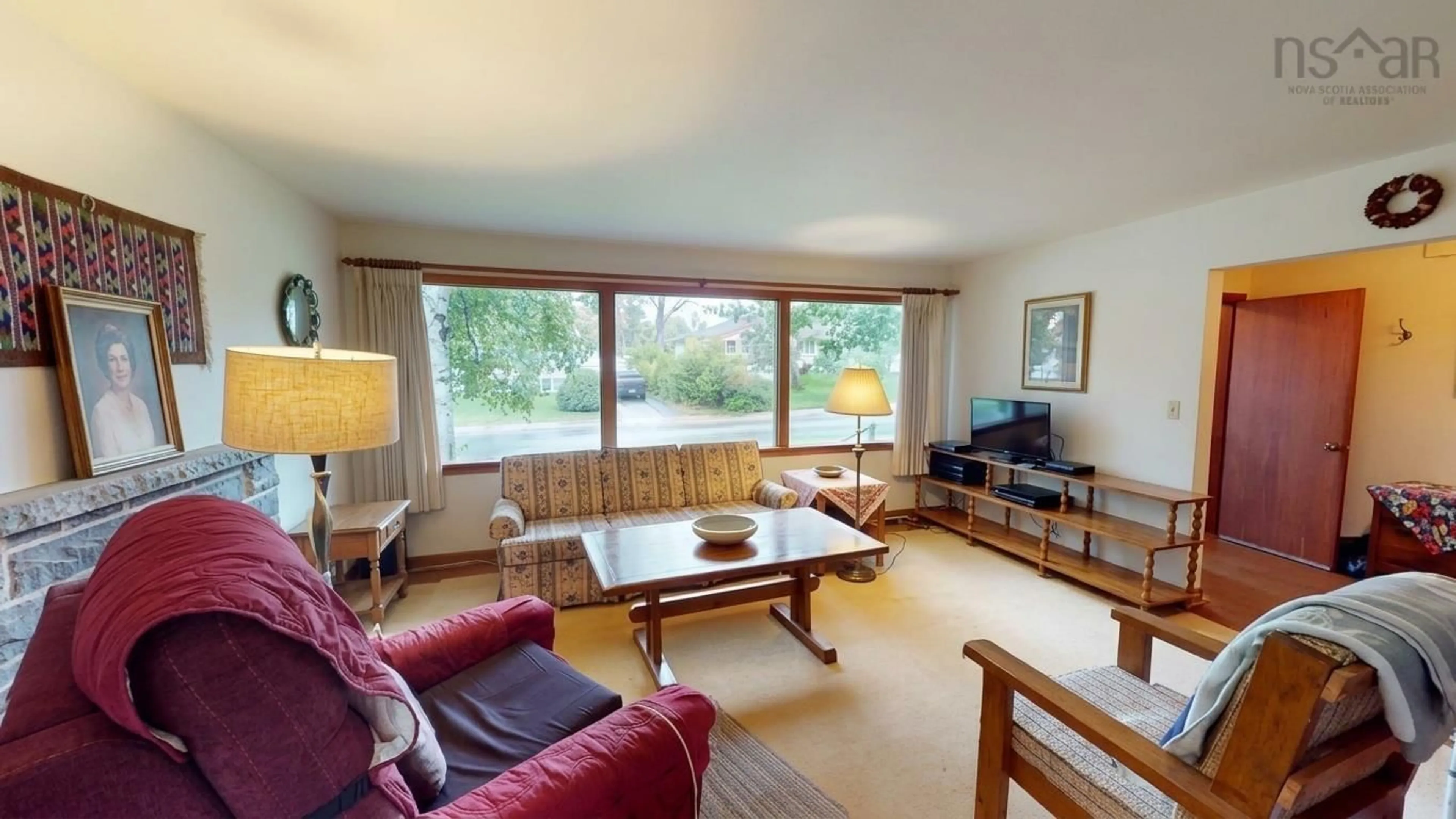 Living room with furniture, wood/laminate floor for 33 Anderson Street, Dartmouth Nova Scotia B2W 2T7