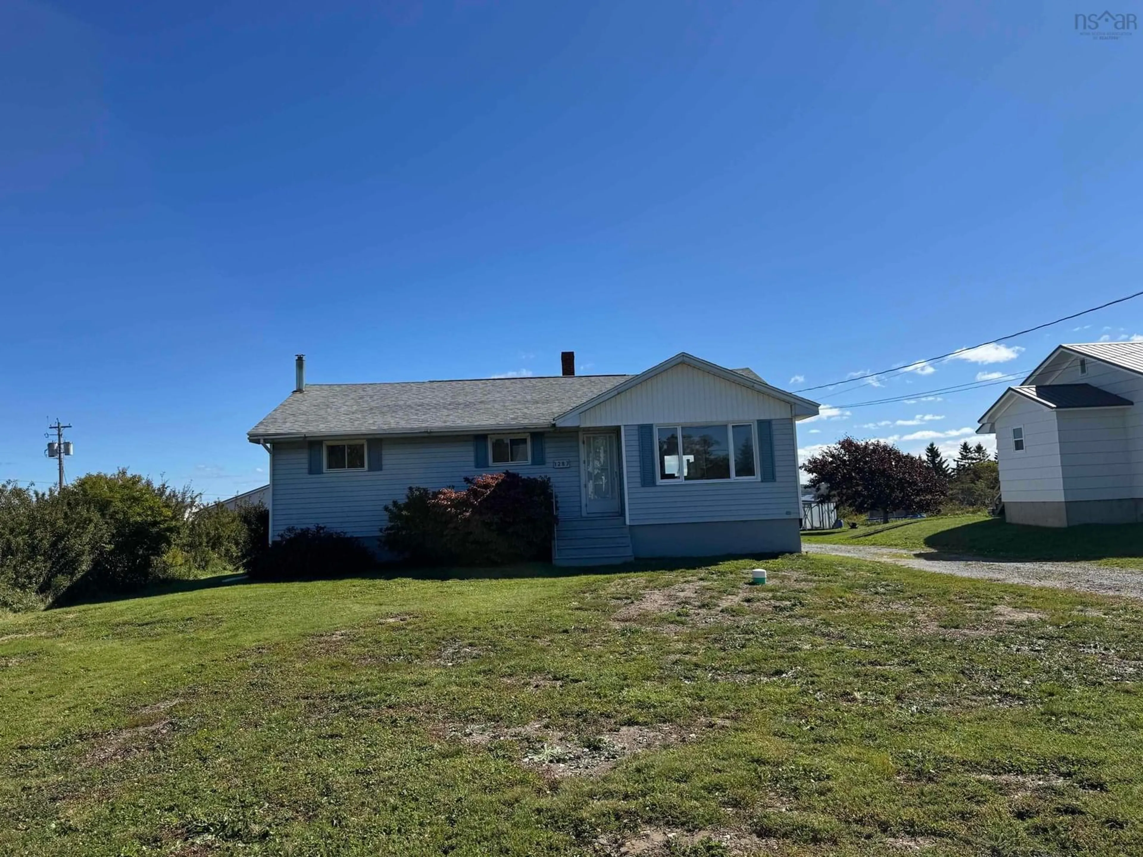 A pic from outside/outdoor area/front of a property/back of a property/a pic from drone, unknown for 1287 Highway 335, Middle West Pubnico Nova Scotia B0W 3S0