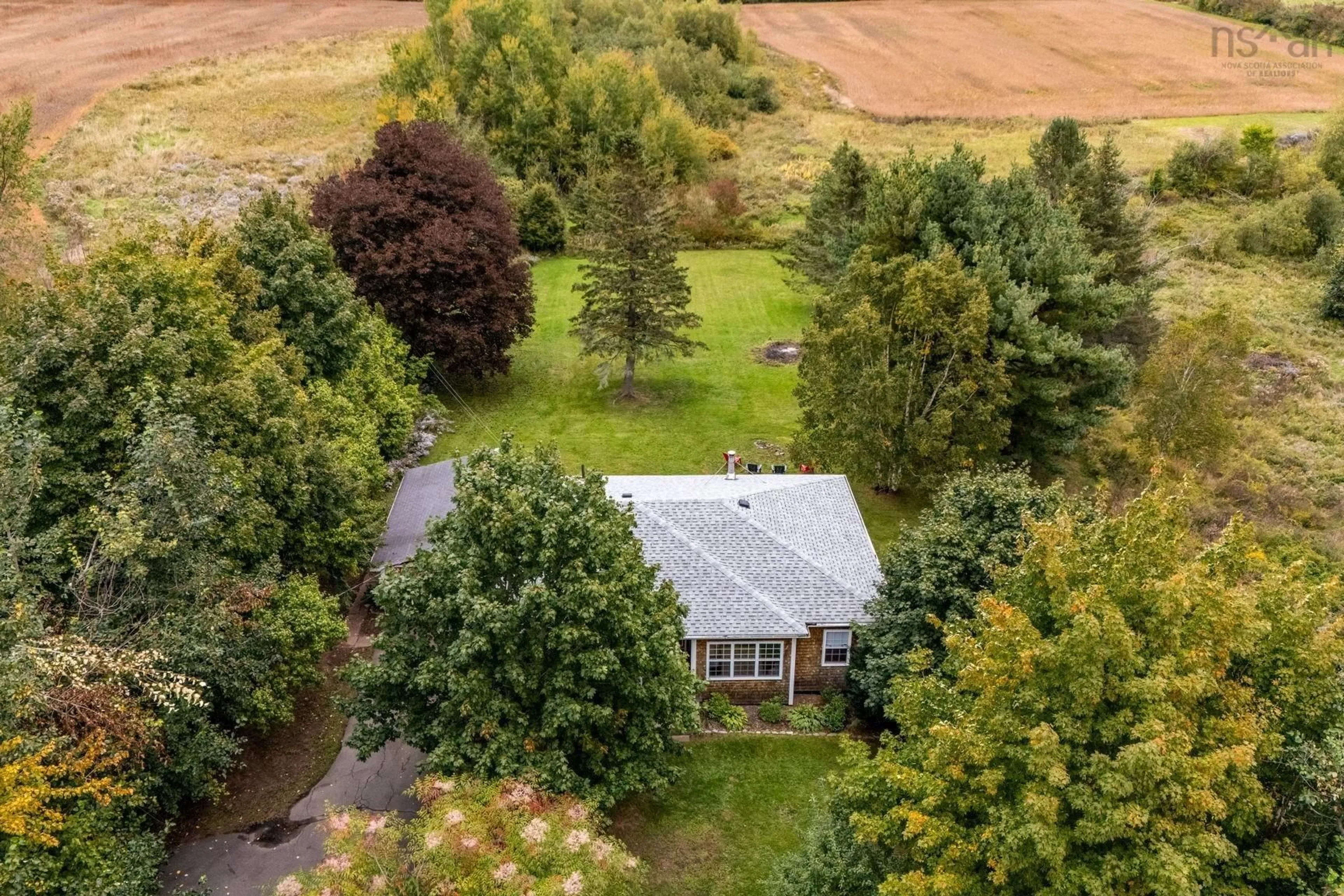 A pic from outside/outdoor area/front of a property/back of a property/a pic from drone, unknown for 788 Highway 341, Upper Dyke Nova Scotia B0P 1J0