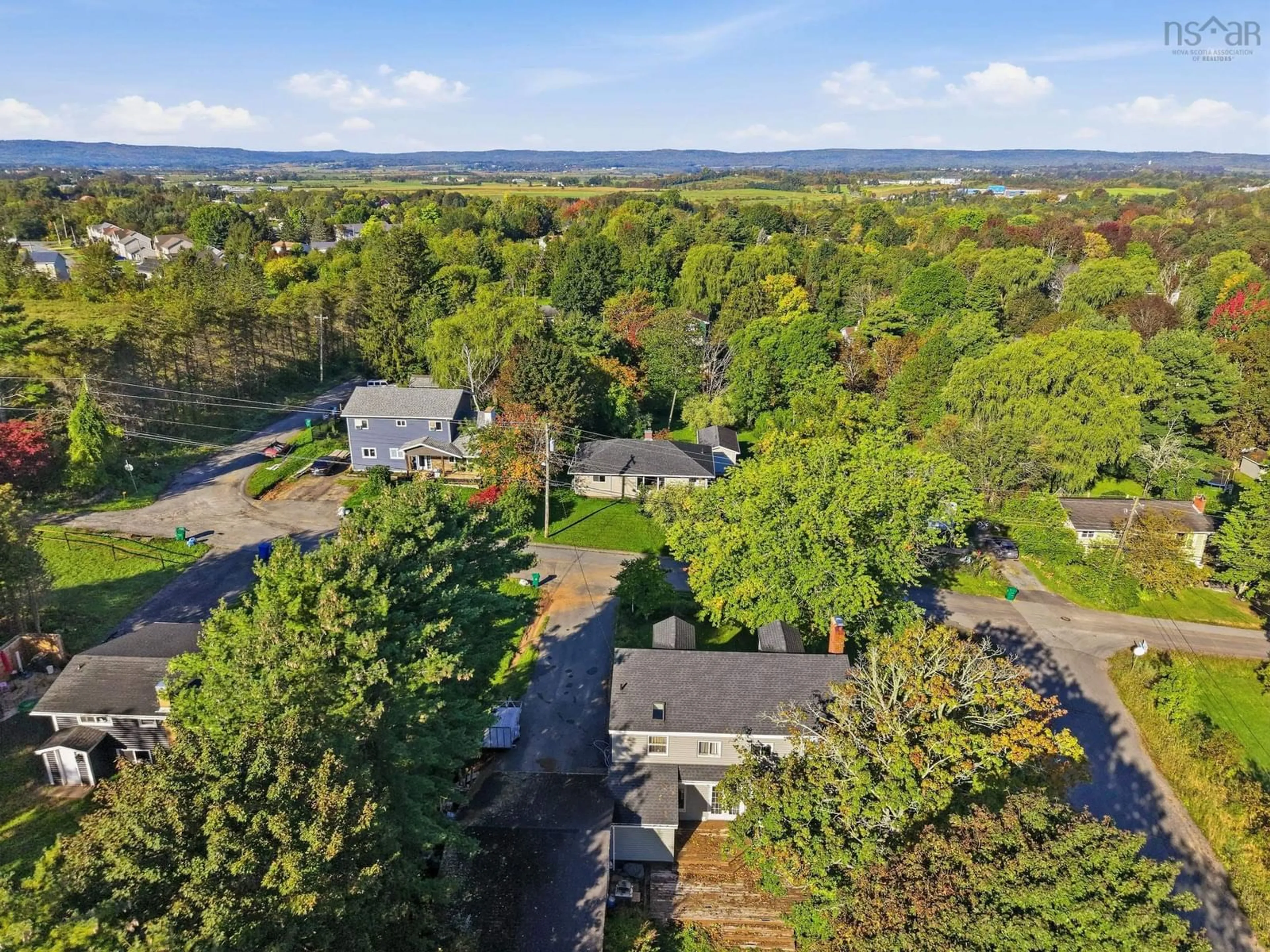 A pic from outside/outdoor area/front of a property/back of a property/a pic from drone, forest/trees view for 122 Campbell Avenue, Windsor Nova Scotia B0N 2T0
