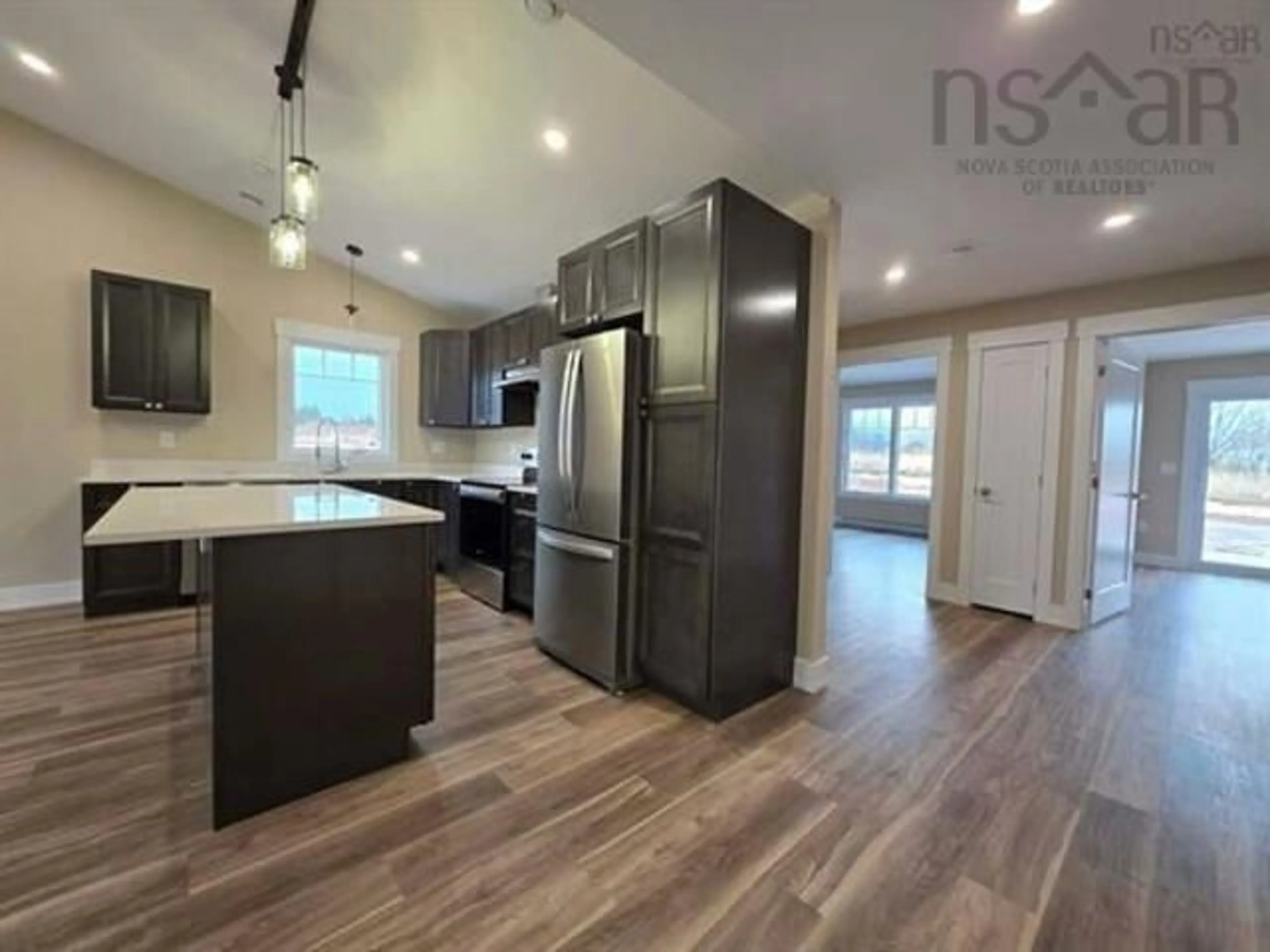 Open concept kitchen, wood/laminate floor for 54 Summer Hill Pl, Upper Onslow Nova Scotia B6L 0G9