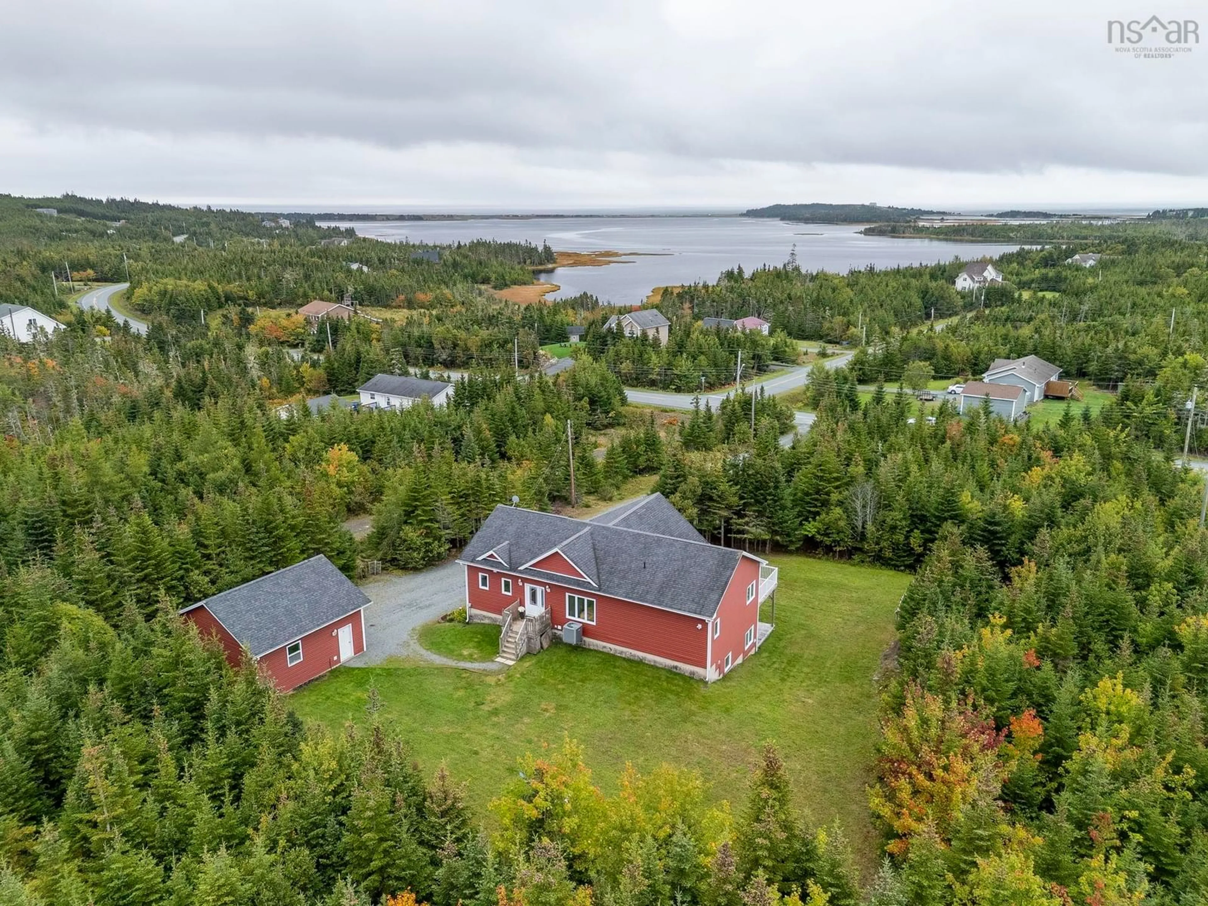 A pic from outside/outdoor area/front of a property/back of a property/a pic from drone, water/lake/river/ocean view for 307 Leslie Rd, East Lawrencetown Nova Scotia B2Z 1T4