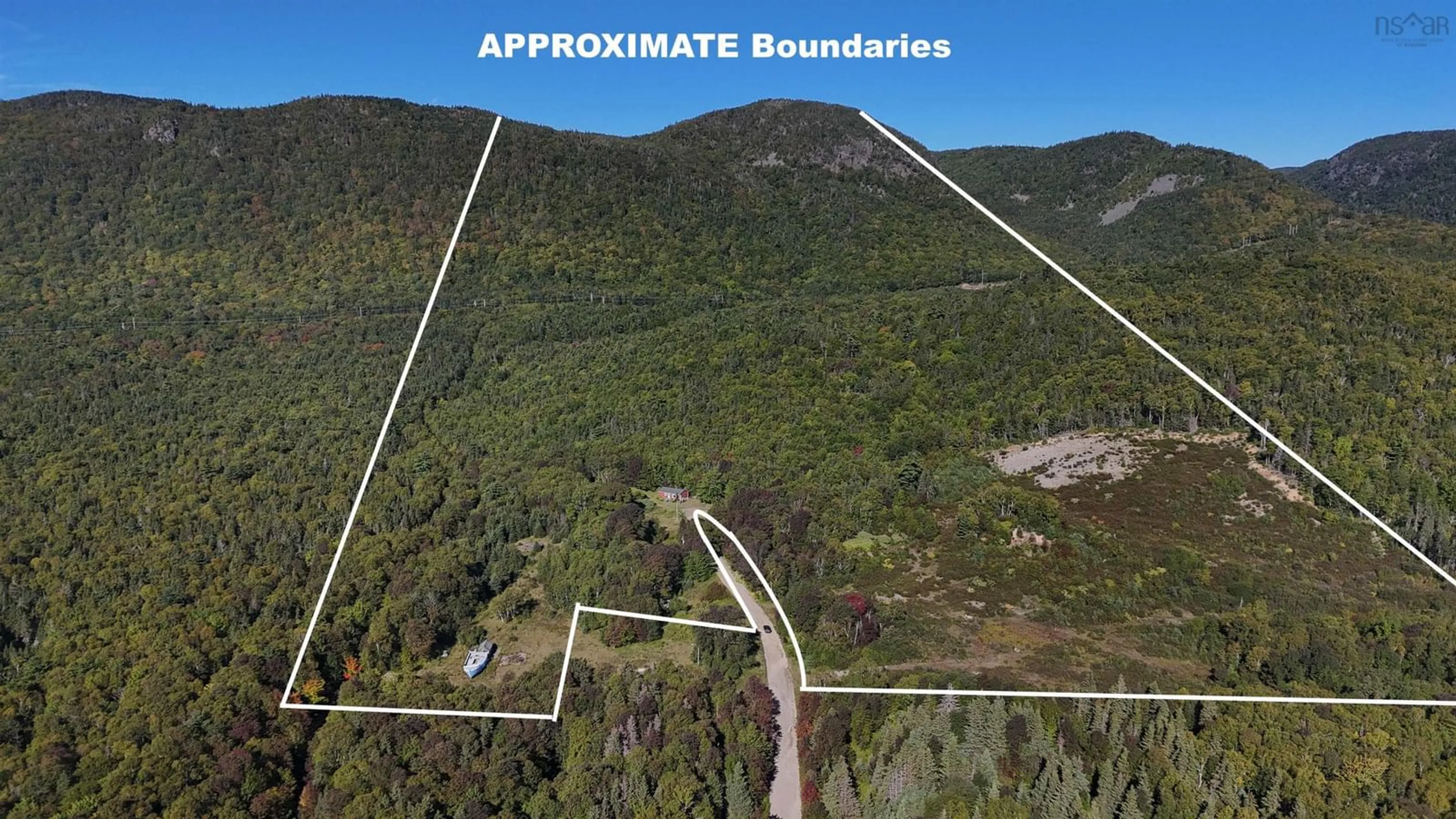 A pic from outside/outdoor area/front of a property/back of a property/a pic from drone, mountain view for 101 Millbrook Road, Wreck Cove Nova Scotia B0C 1H0