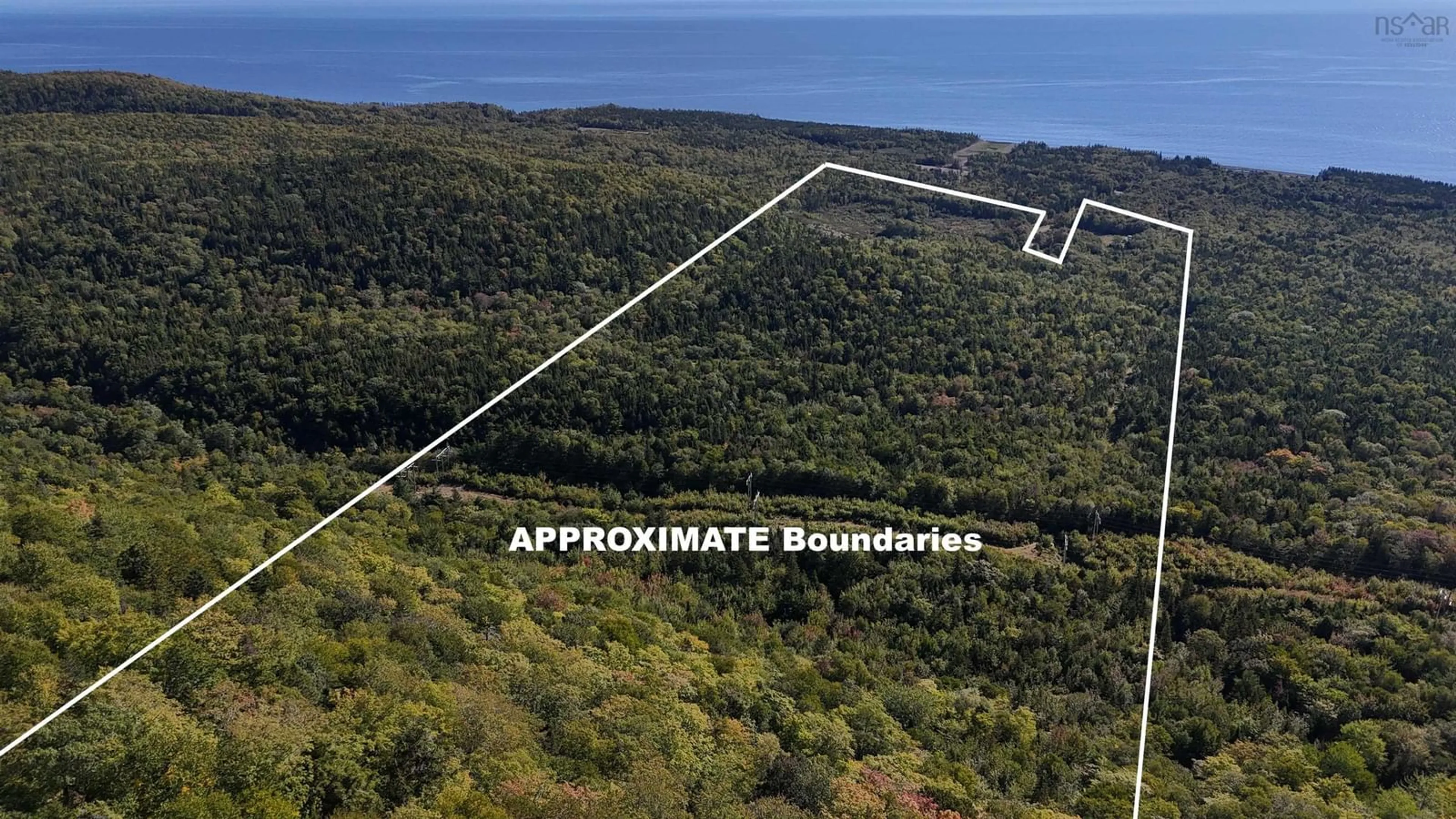 A pic from outside/outdoor area/front of a property/back of a property/a pic from drone, water/lake/river/ocean view for 101 Millbrook Road, Wreck Cove Nova Scotia B0C 1H0