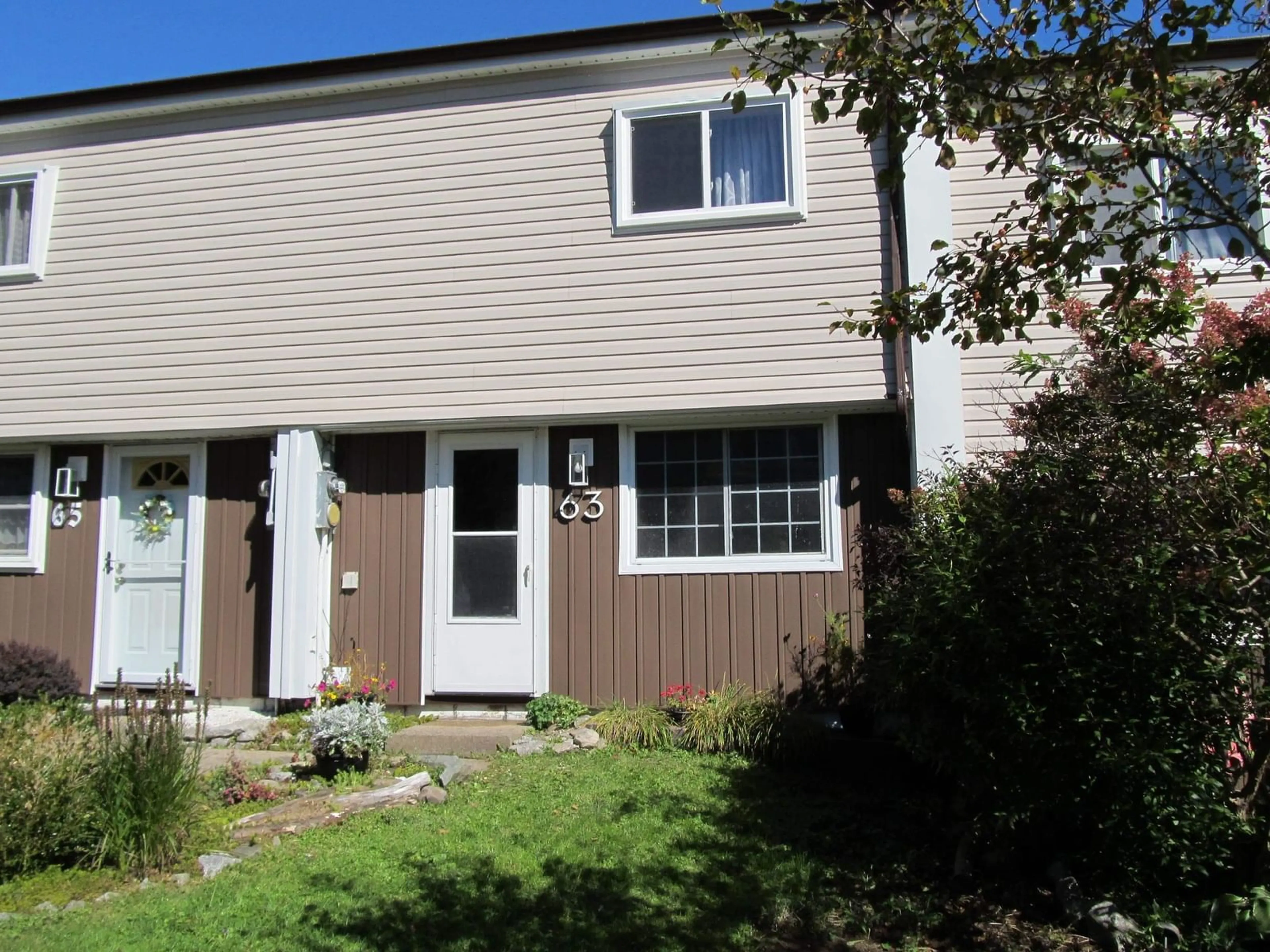 Home with vinyl exterior material, street for 63 Drumdonald Rd, Halifax Nova Scotia B3P 2L1