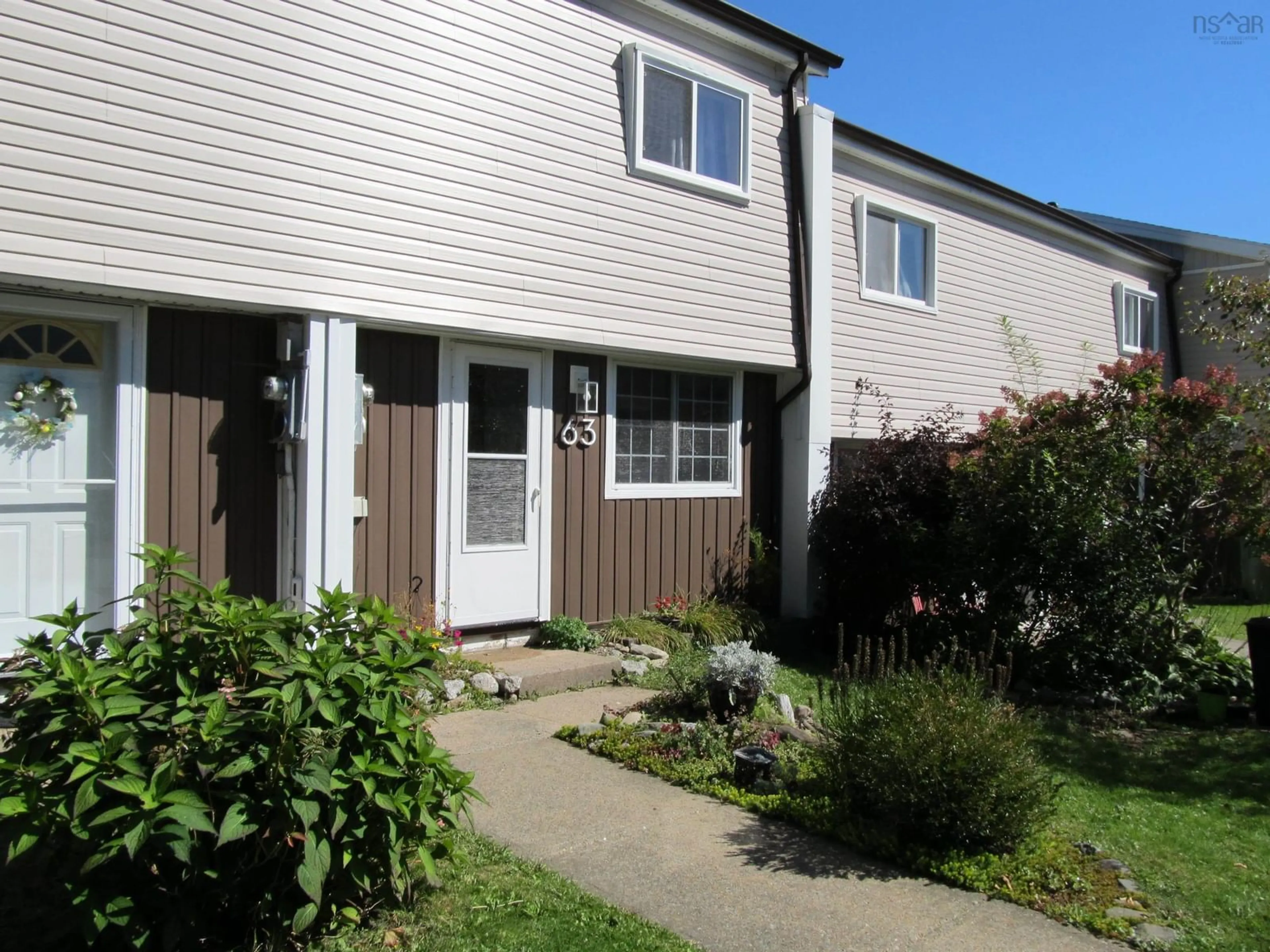 Home with vinyl exterior material, street for 63 Drumdonald Rd, Halifax Nova Scotia B3P 2L1