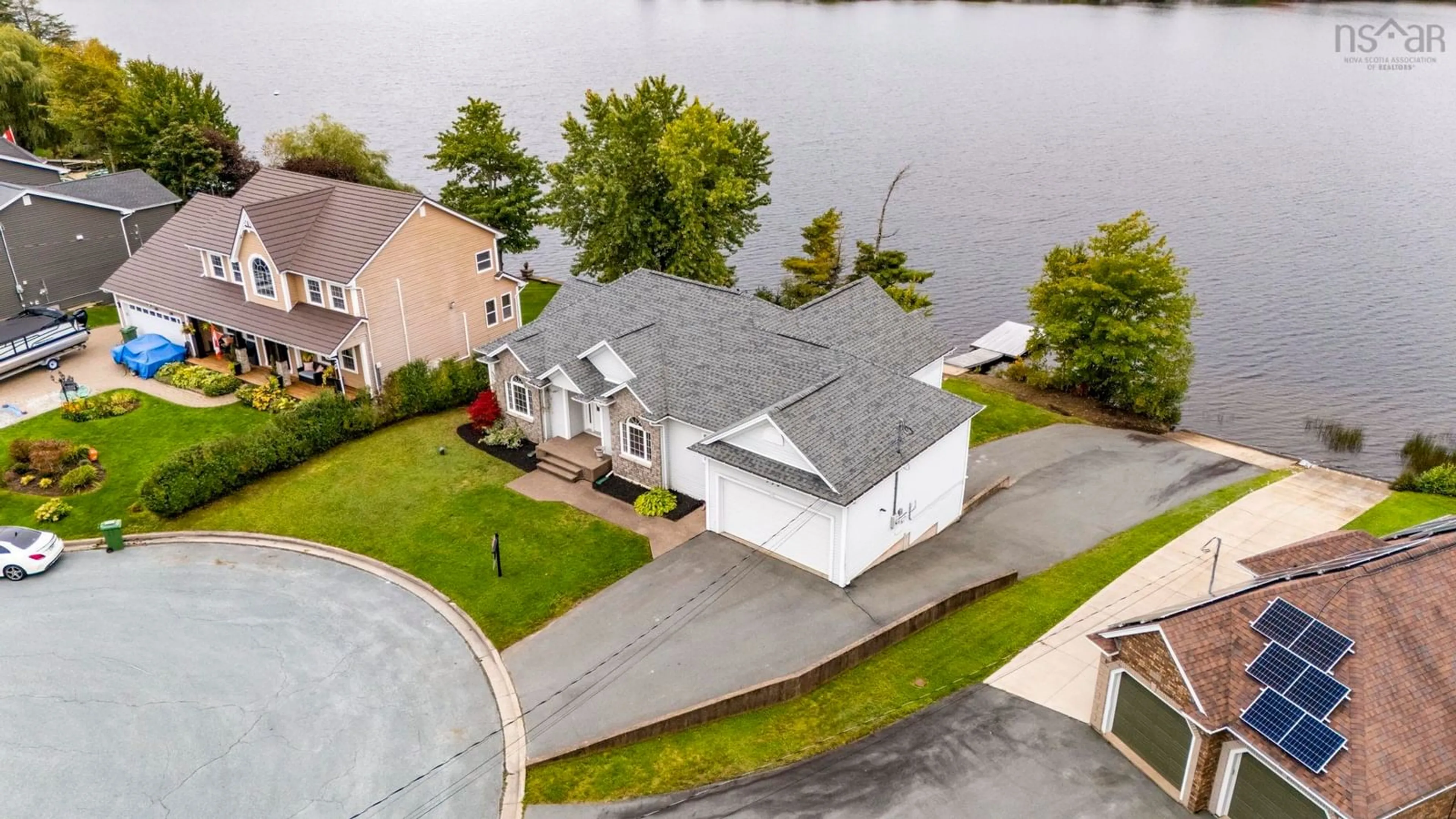 A pic from outside/outdoor area/front of a property/back of a property/a pic from drone, water/lake/river/ocean view for 550 Springfield Lake Rd, Middle Sackville Nova Scotia B4E 3K4