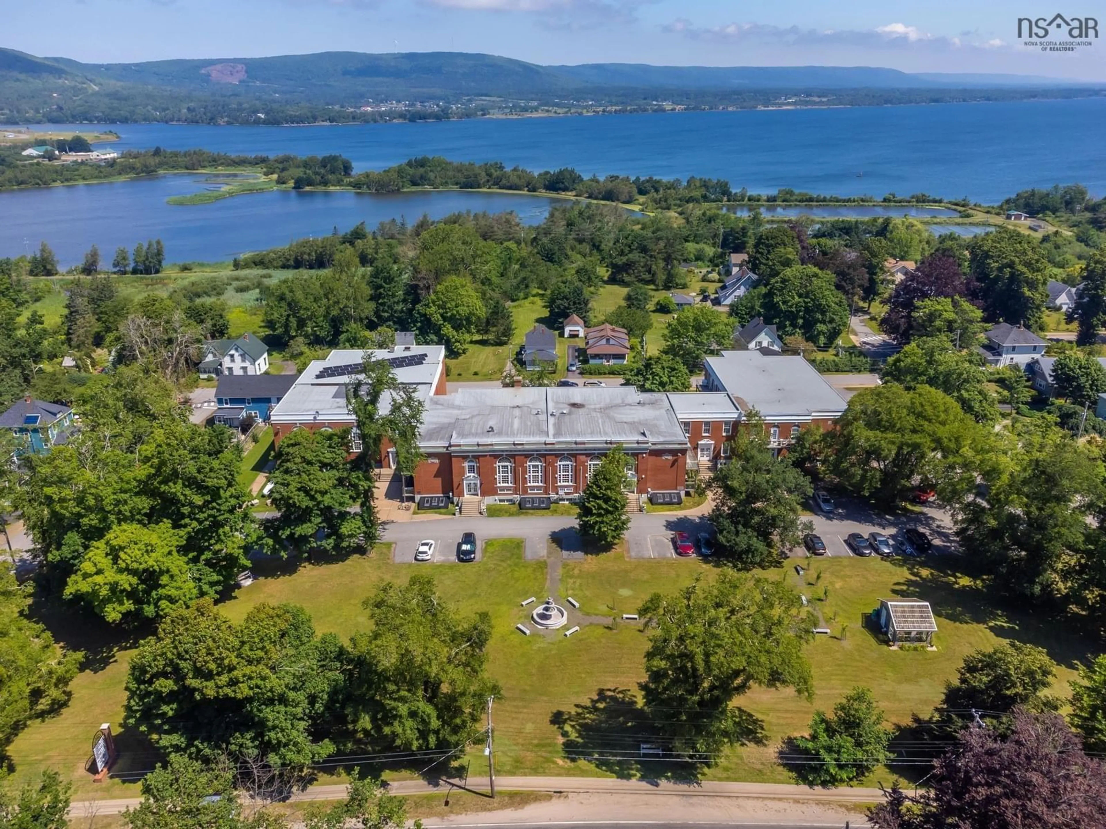 A pic from outside/outdoor area/front of a property/back of a property/a pic from drone, water/lake/river/ocean view for 151 Ritchie St #101, Annapolis Royal Nova Scotia B0S 1A0