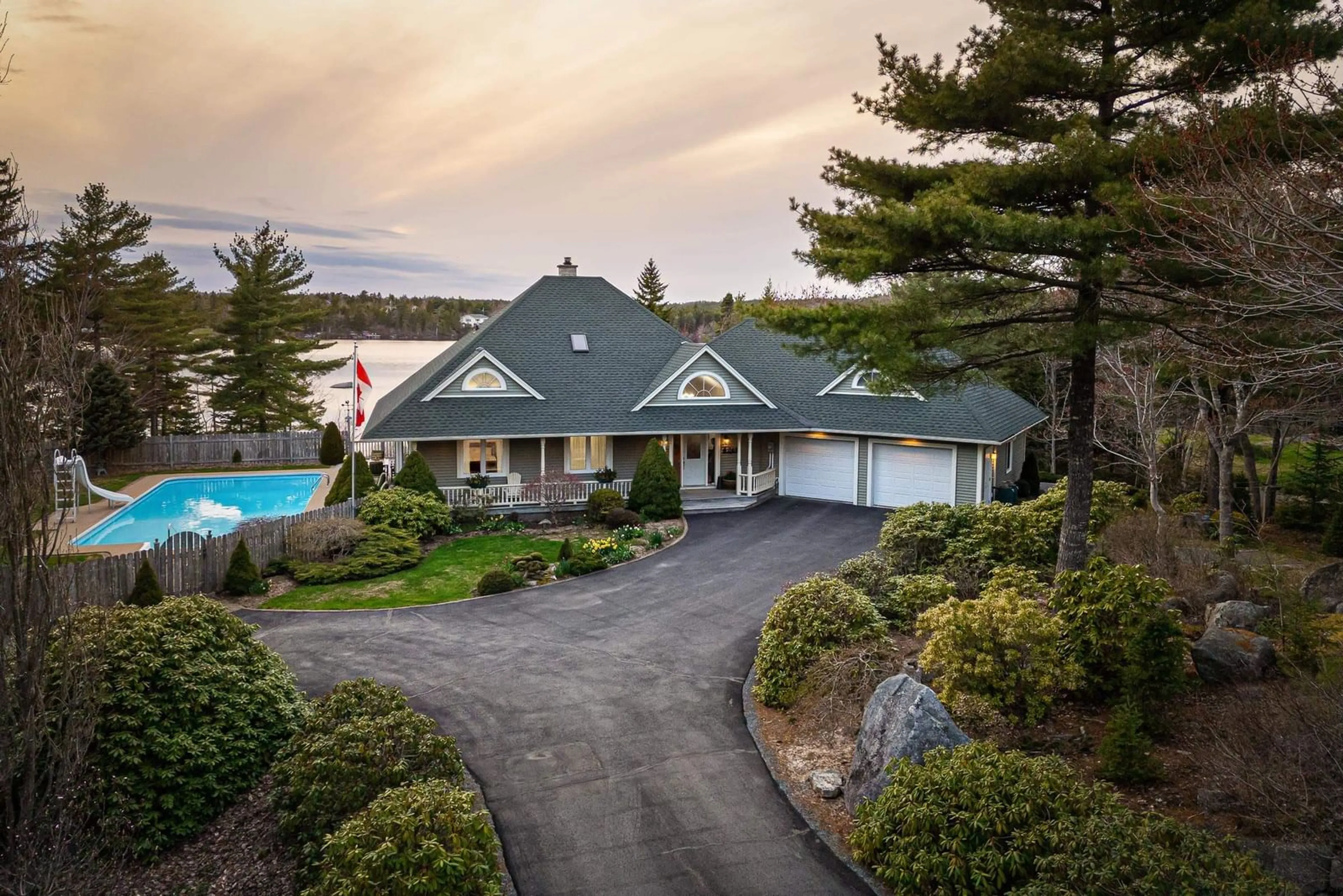 A pic from outside/outdoor area/front of a property/back of a property/a pic from drone, water/lake/river/ocean view for 243 Lakeshore Dr, Hammonds Plains Nova Scotia B4B 1X1