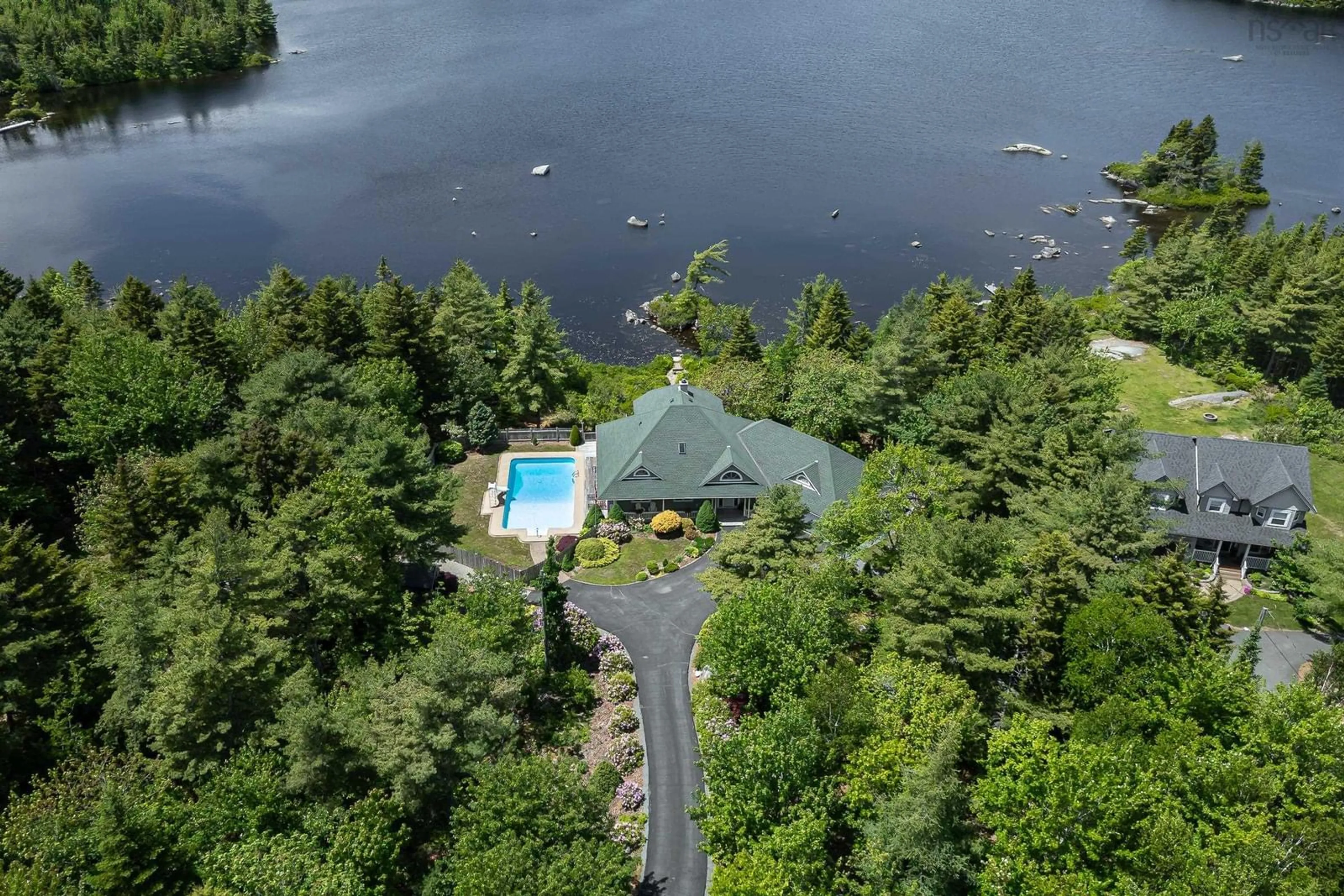 A pic from outside/outdoor area/front of a property/back of a property/a pic from drone, water/lake/river/ocean view for 243 Lakeshore Dr, Hammonds Plains Nova Scotia B4B 1X1